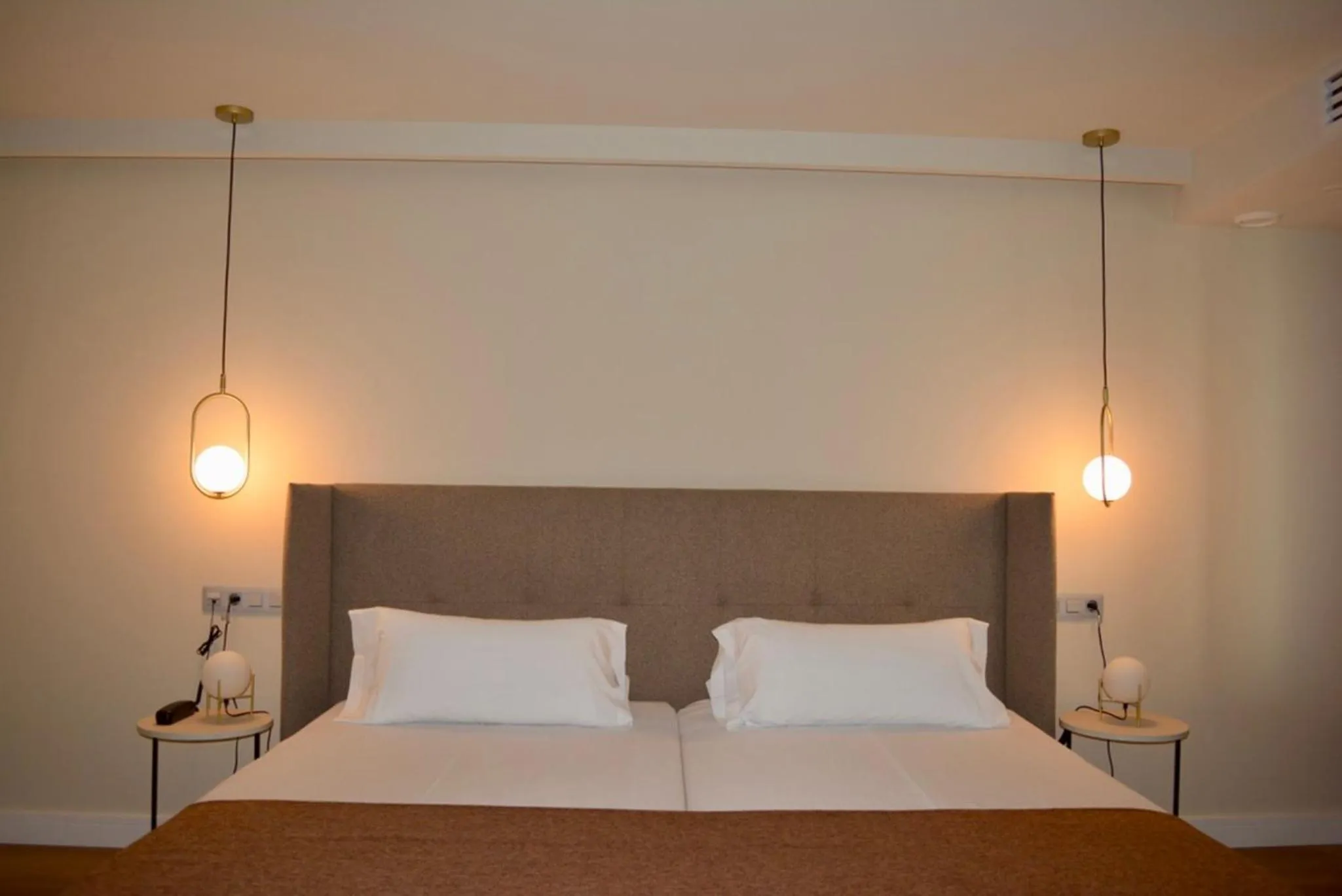 Bed in HOTEL CORONA DE PADRÓN