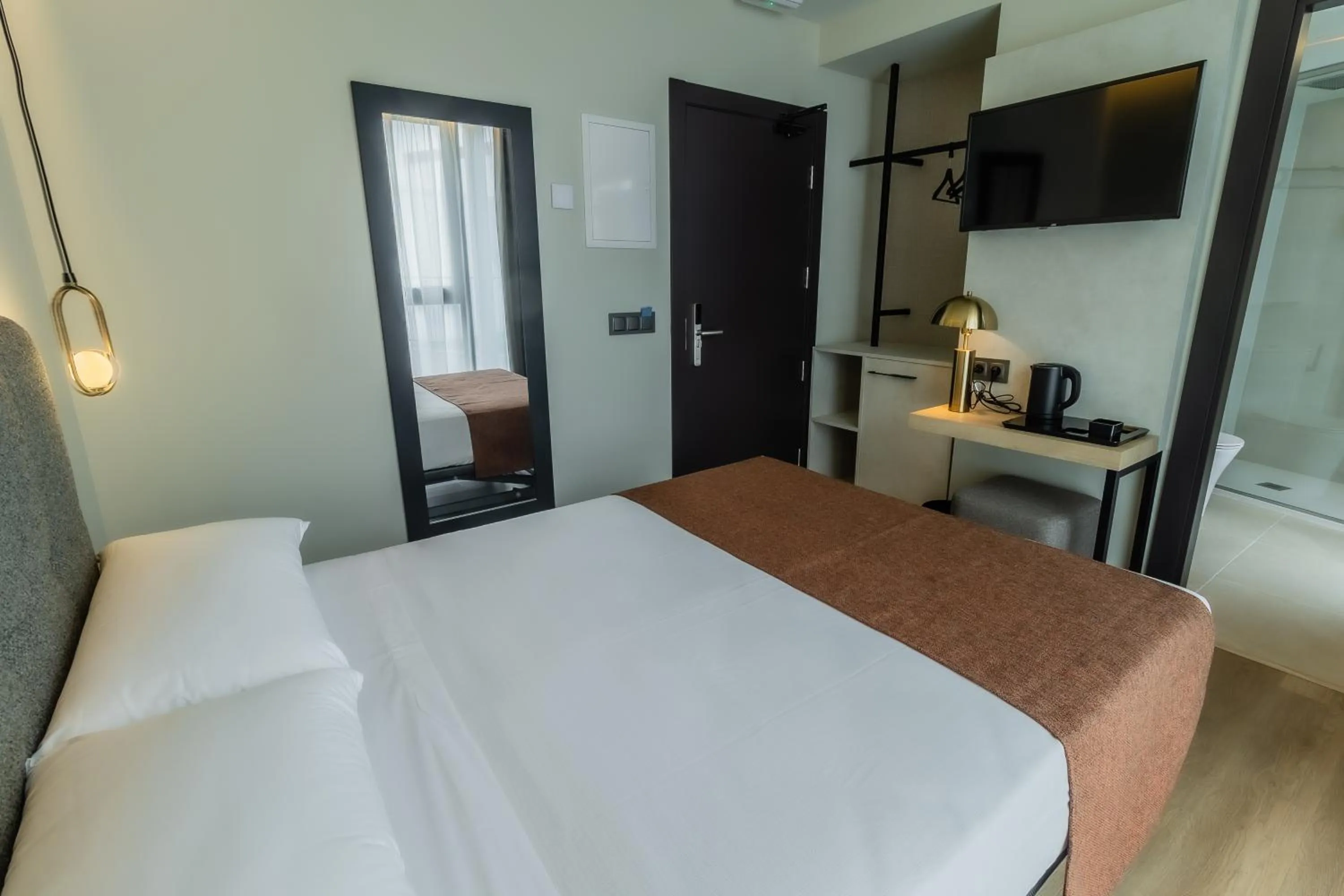 Photo of the whole room, Bed in HOTEL CORONA DE PADRÓN