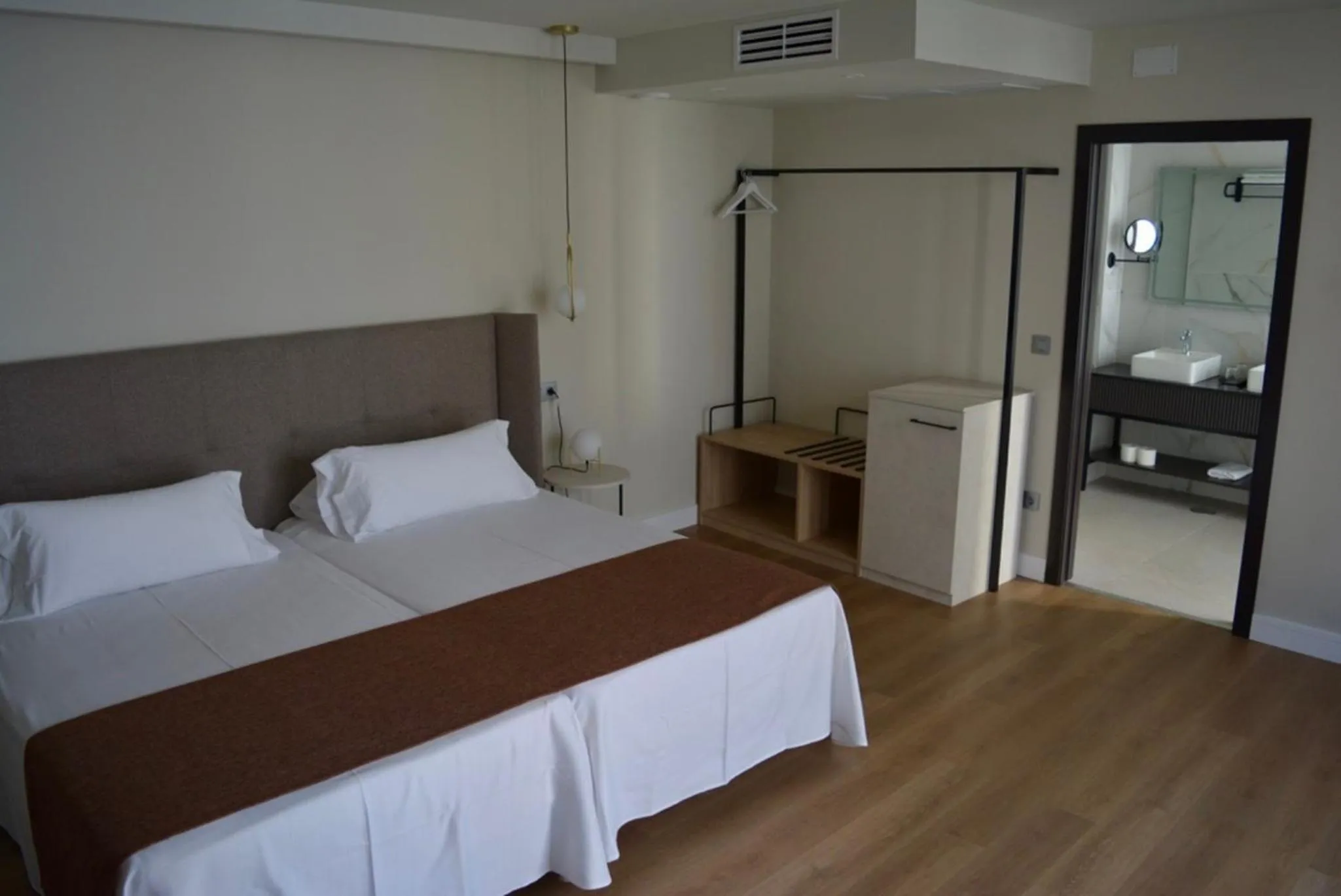 Bed in HOTEL CORONA DE PADRÓN