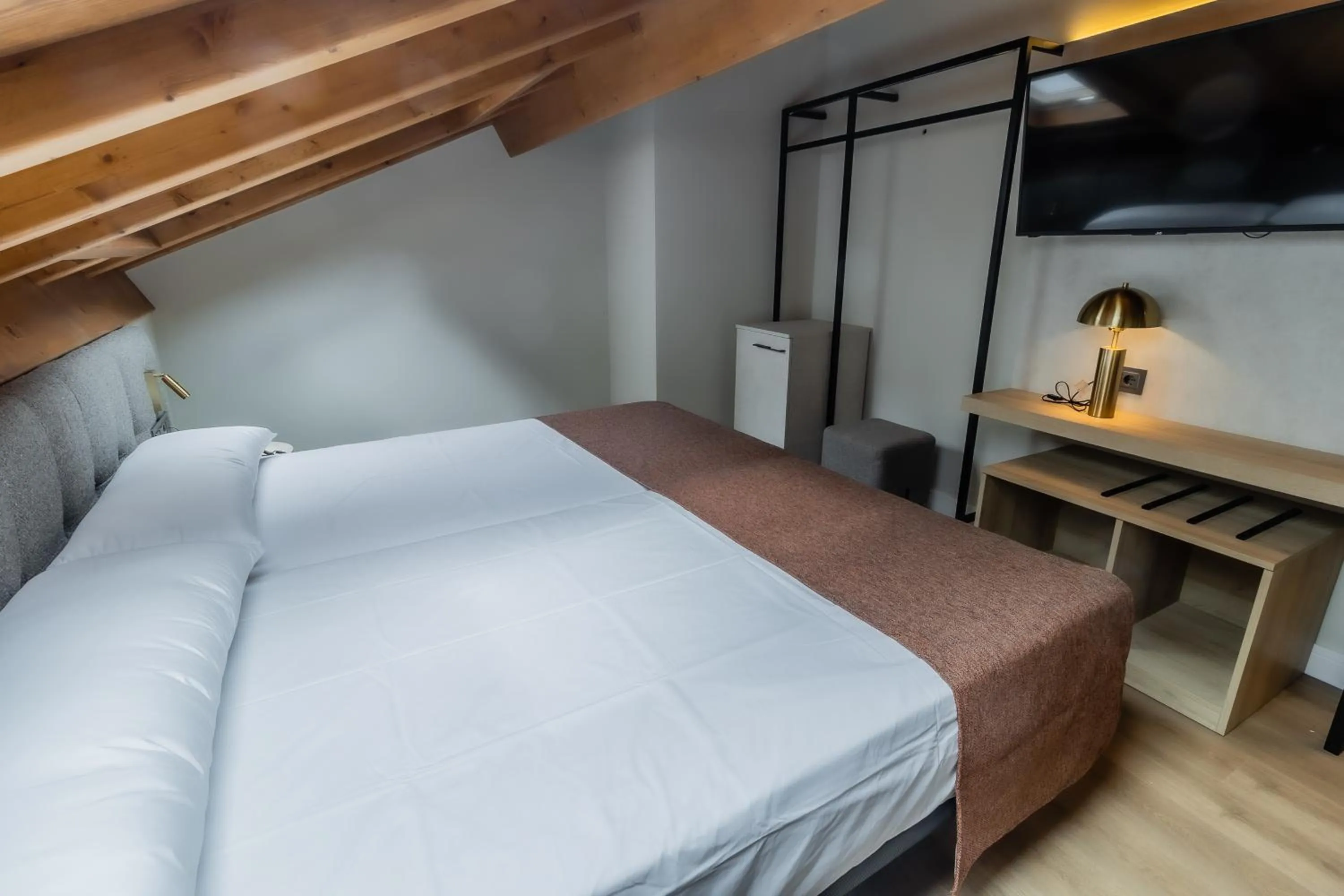 Bed in HOTEL CORONA DE PADRÓN