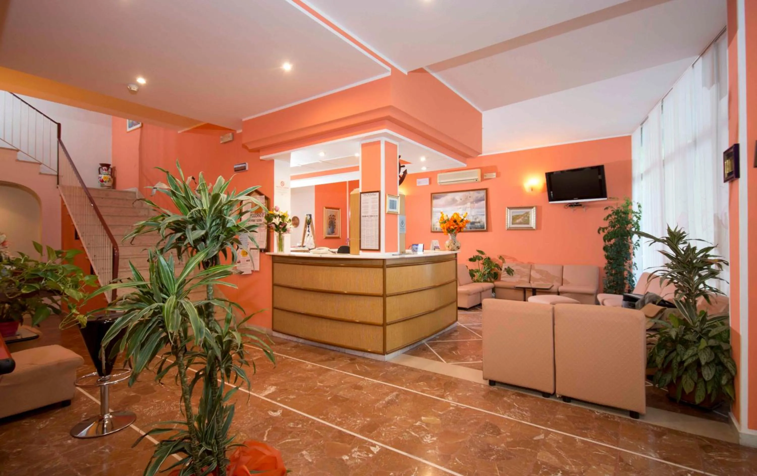 Communal lounge/ TV room in Hotel Veliero