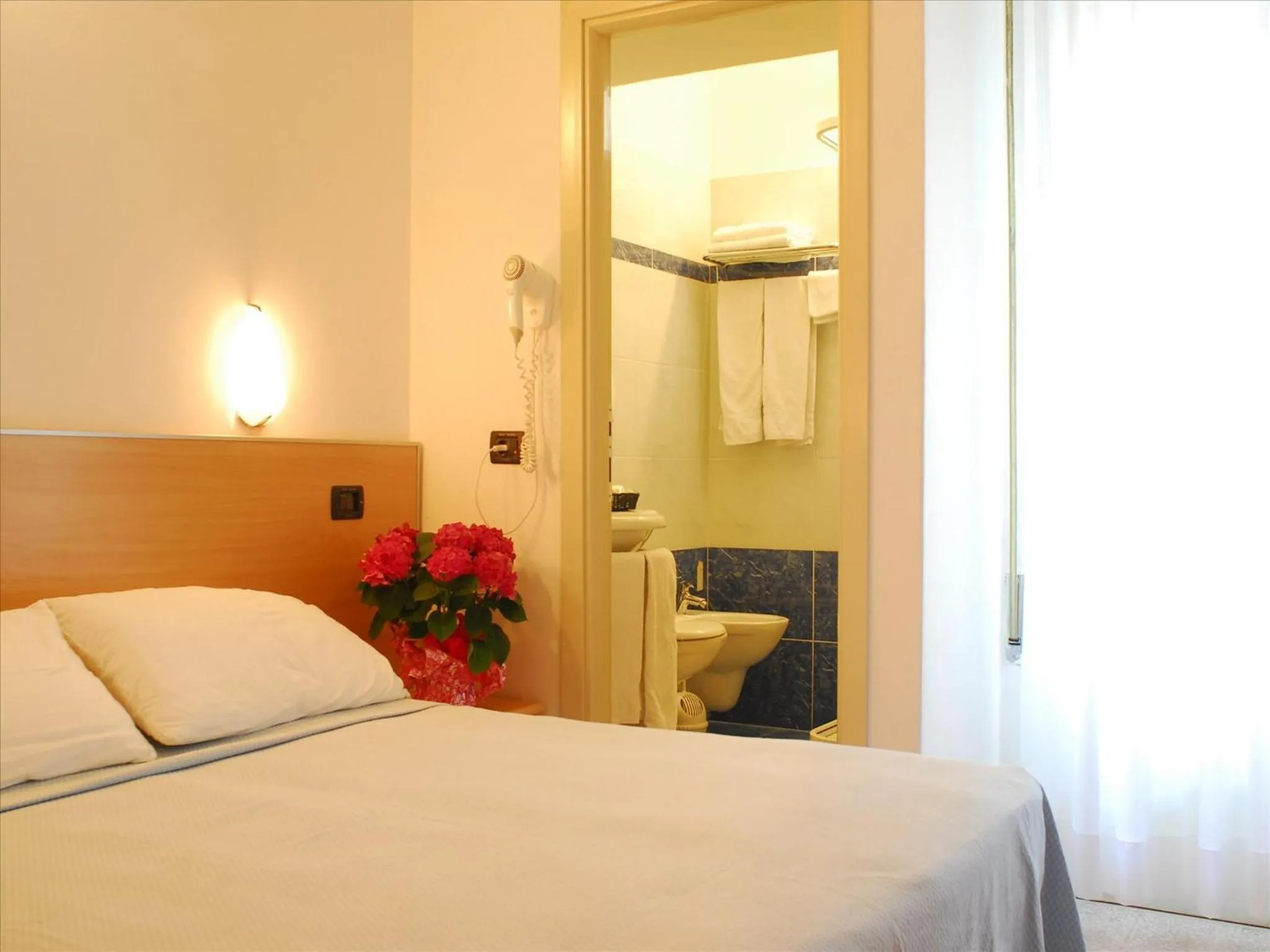 Bed in Hotel Veliero