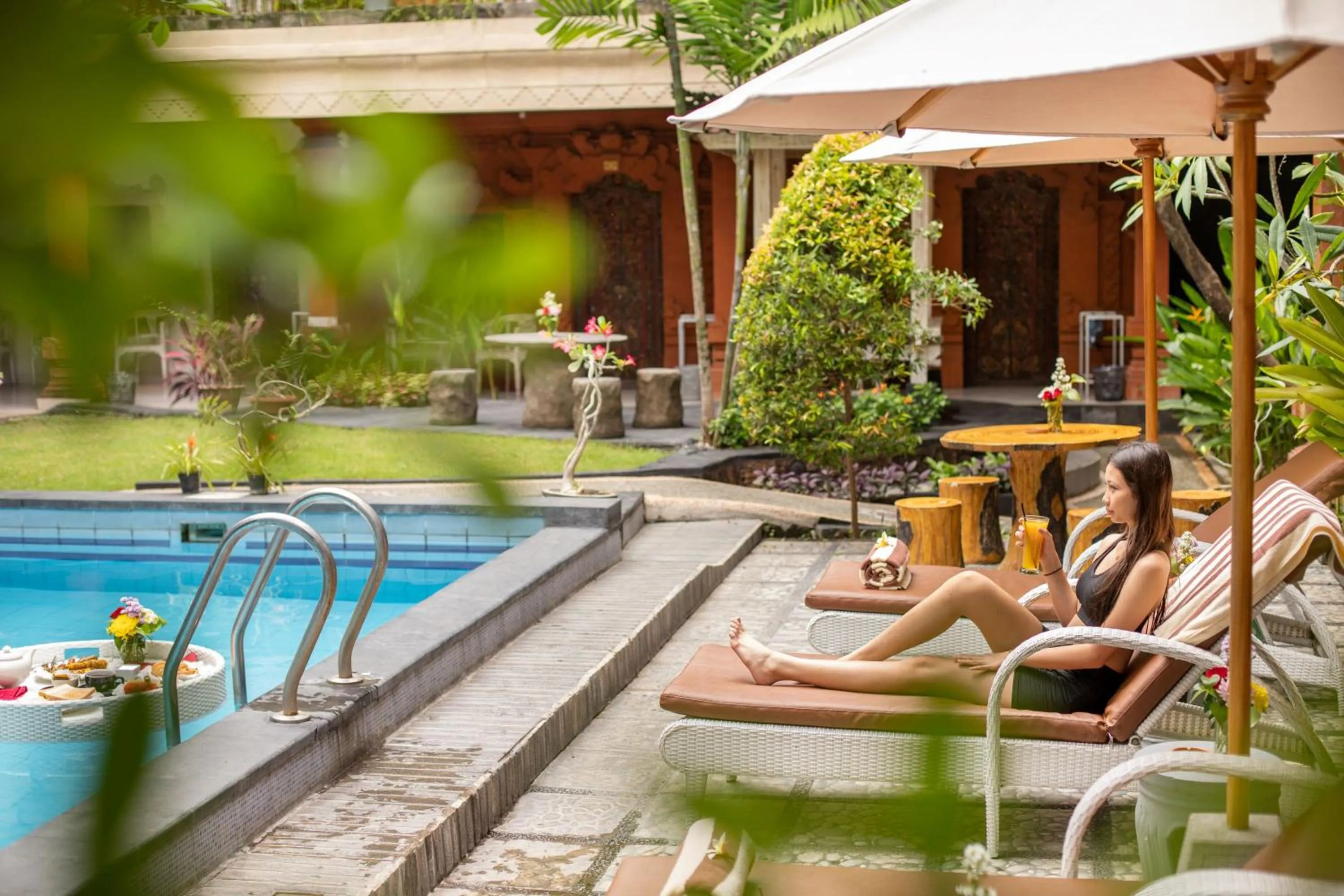 Swimming pool in Lumbung Sari Hotel Legian