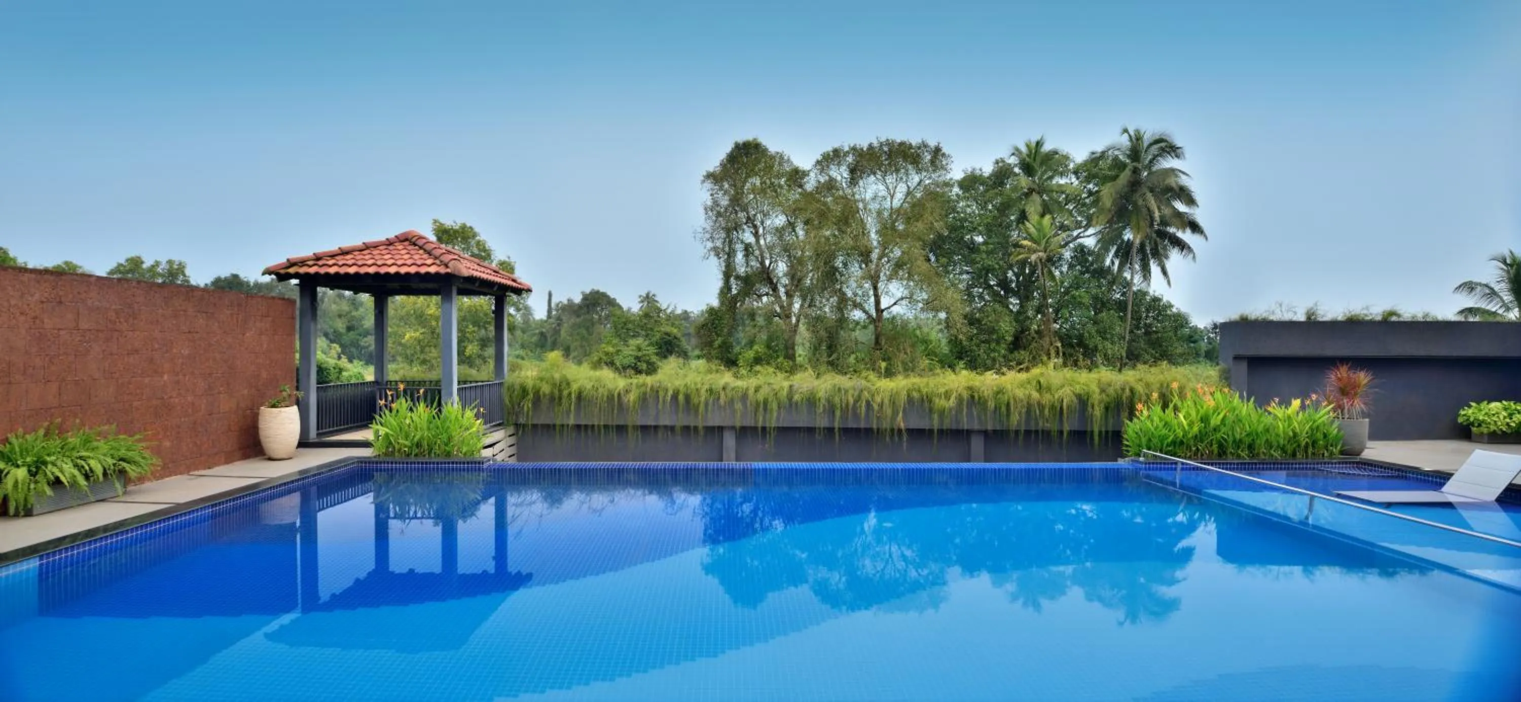 Swimming pool in Citadines Arpora Nagoa Goa