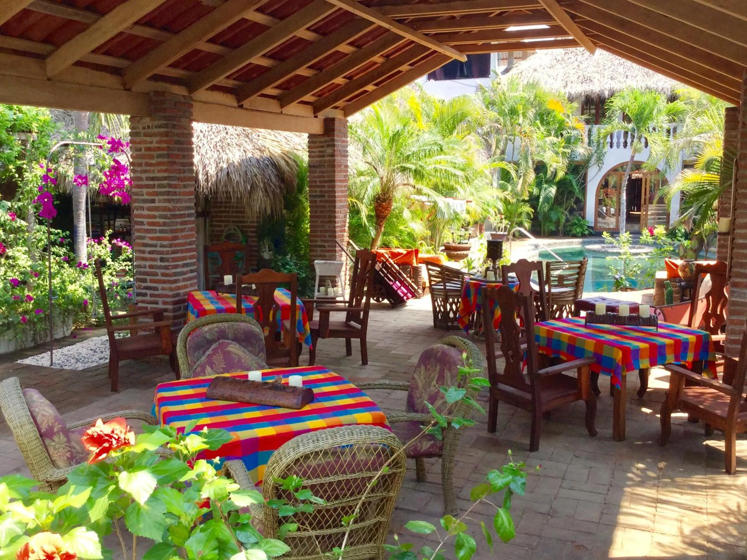 Communal lounge/ TV room in Hacienda La Rusa