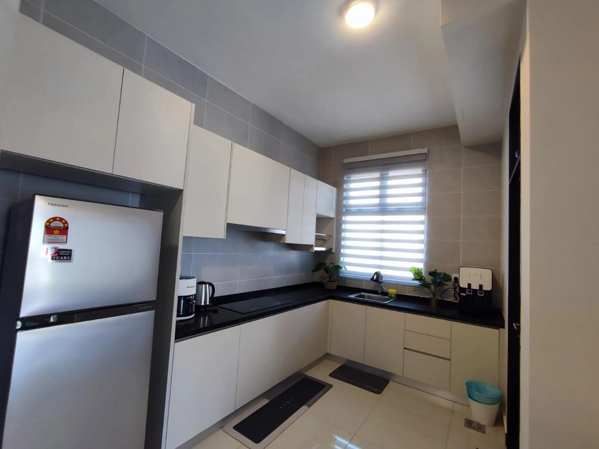 Kitchen or kitchenette in Twin Tower Johor Bahru by Glex