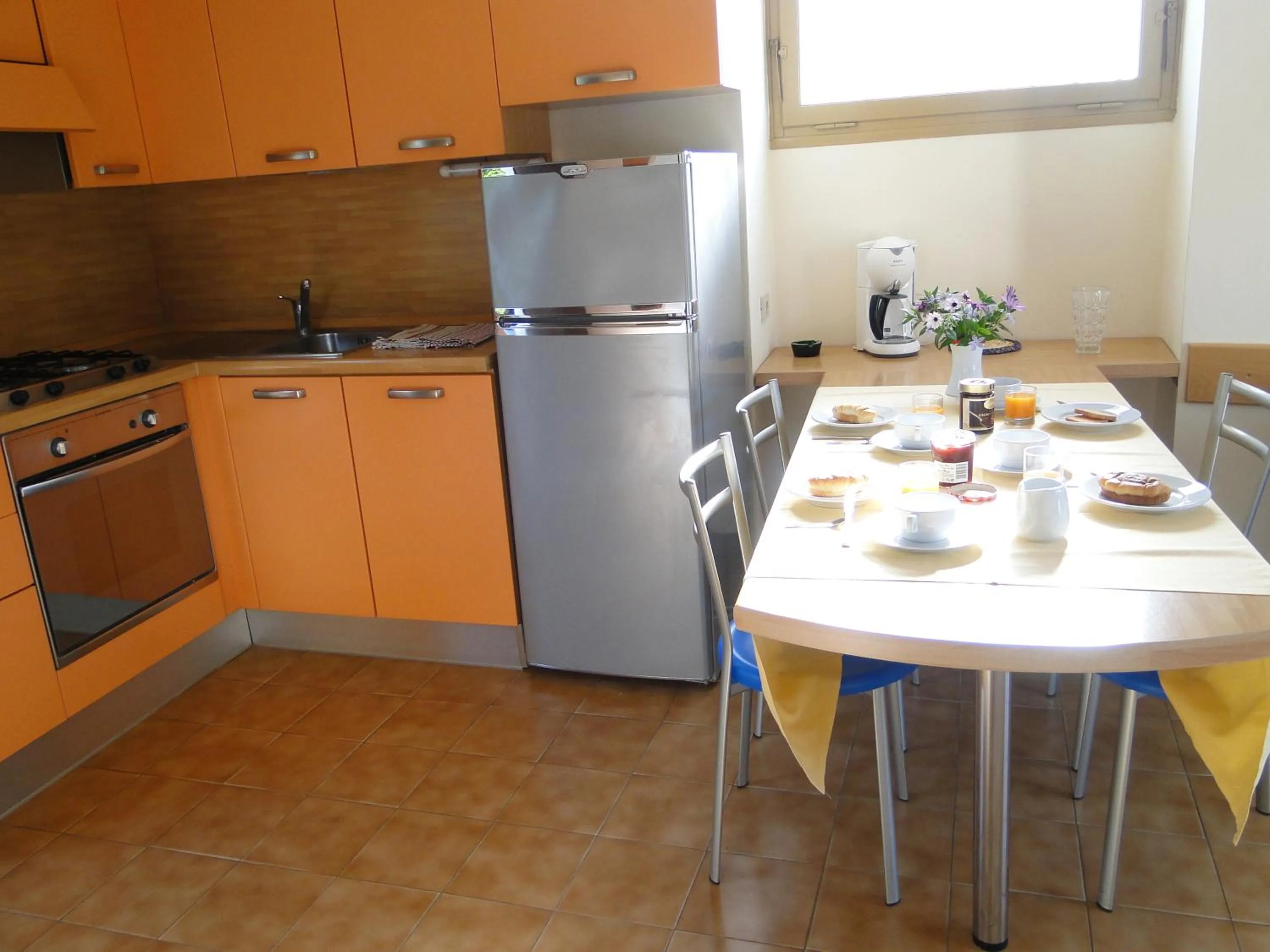 Kitchen or kitchenette in Residence La Carruba