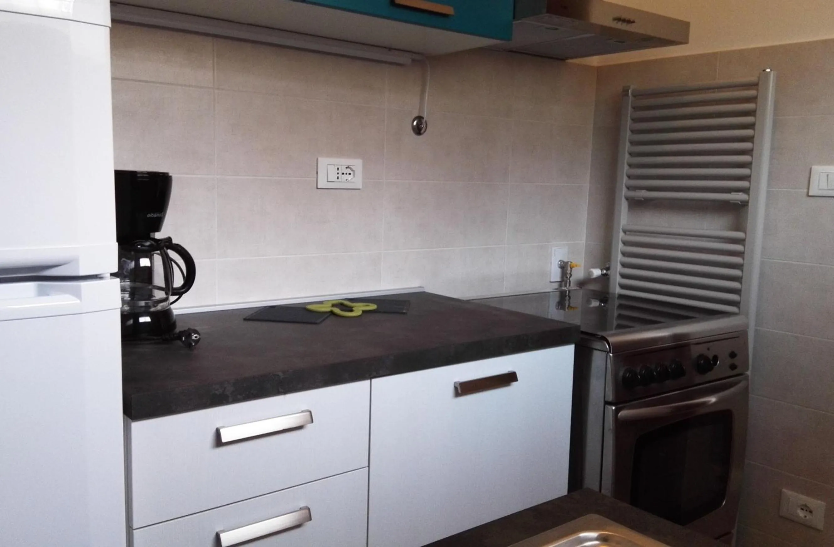 Kitchen or kitchenette in Residence La Carruba