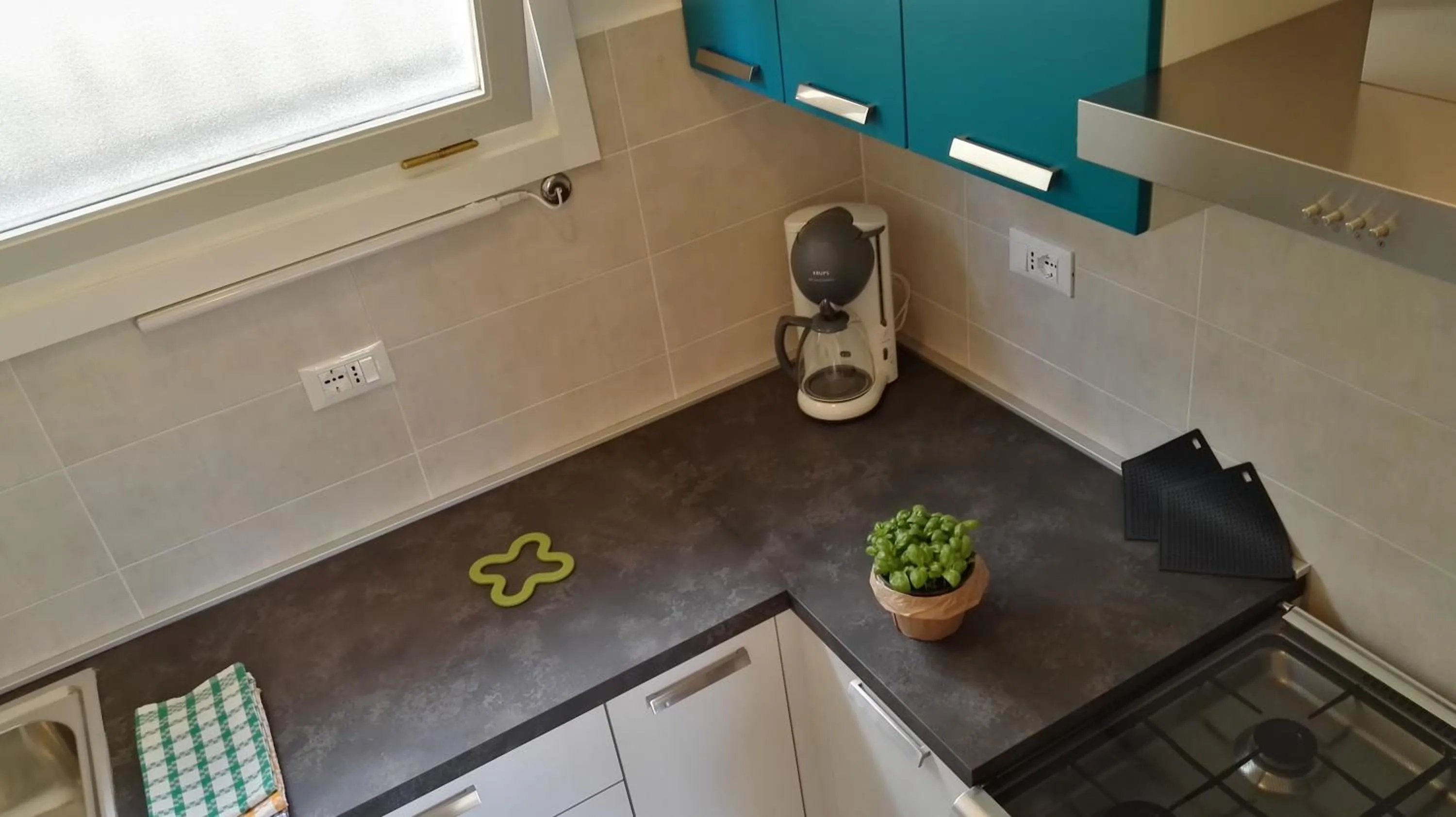 Kitchen or kitchenette in Residence La Carruba