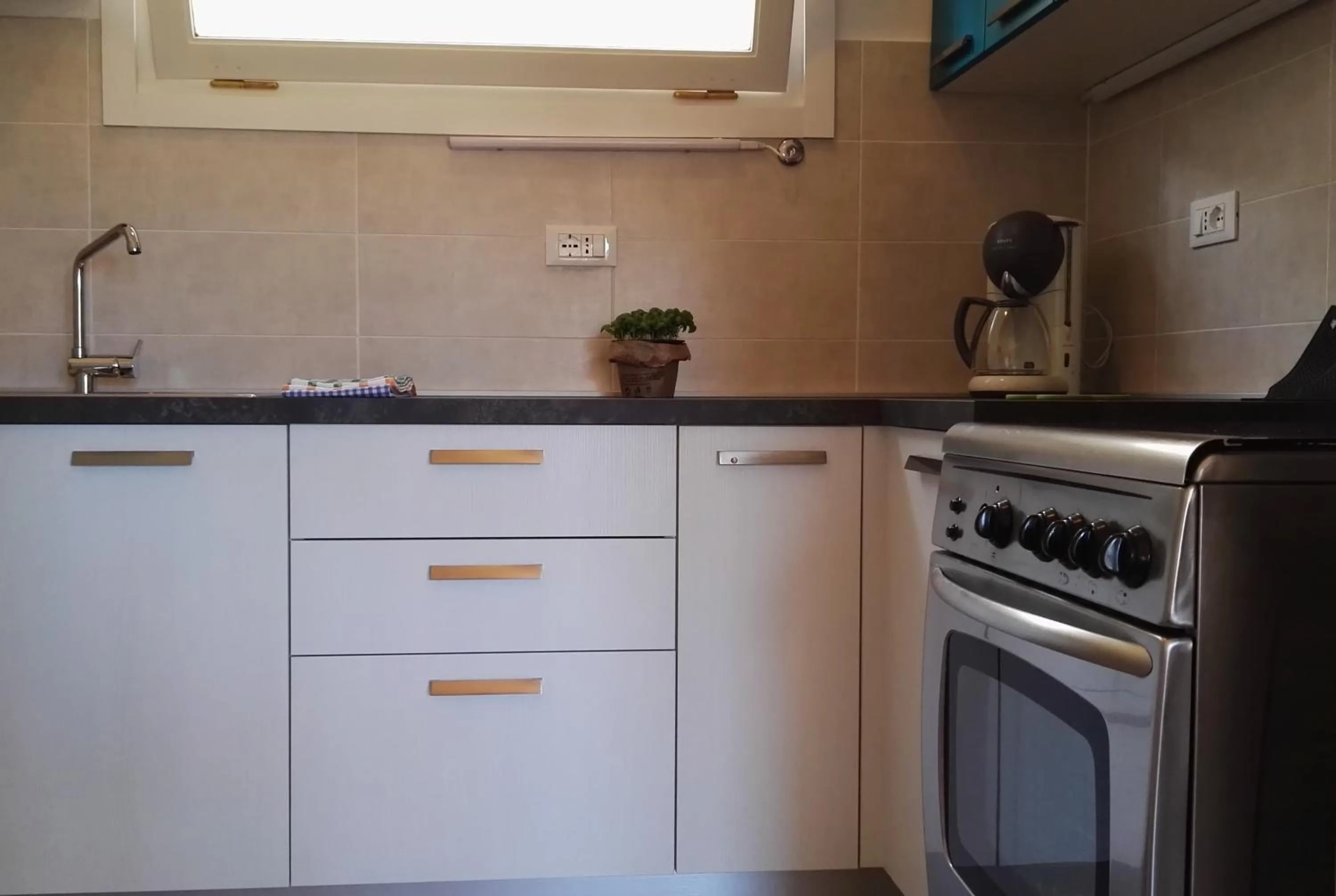 Kitchen or kitchenette in Residence La Carruba