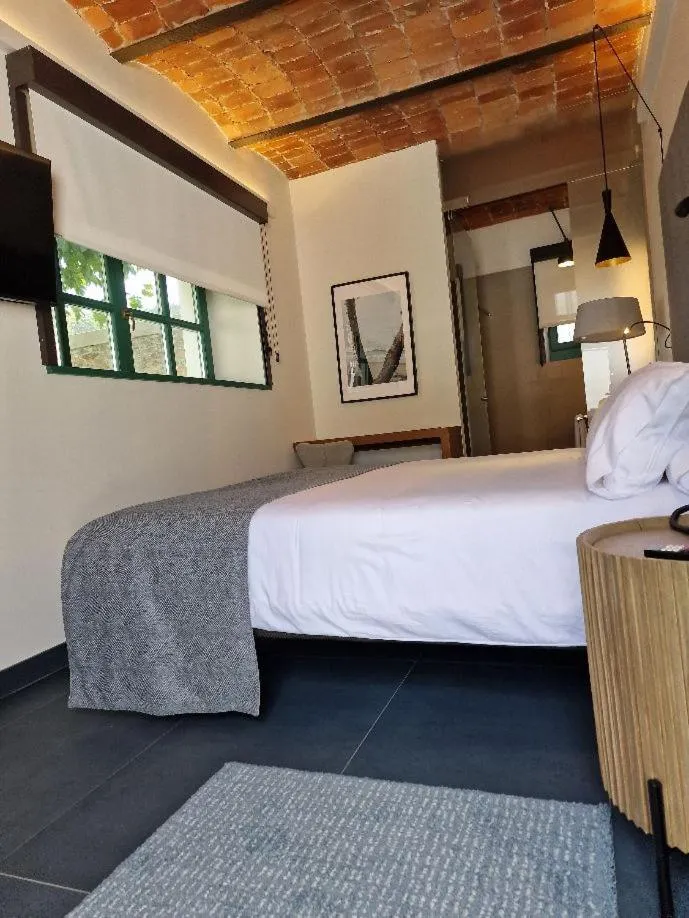 Photo of the whole room, Bed in Hotel El Rosal de Cudillero