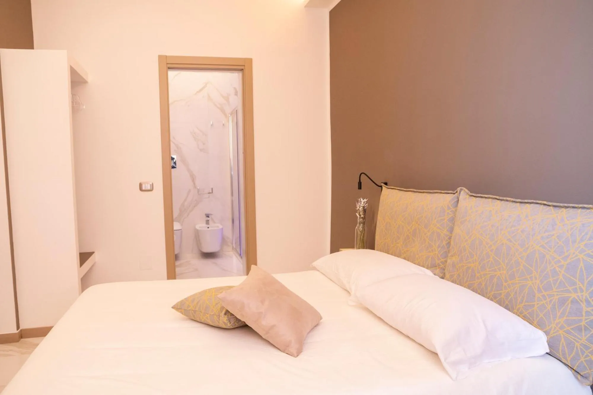 Bed in BelMa' Aparthotel and Rooms