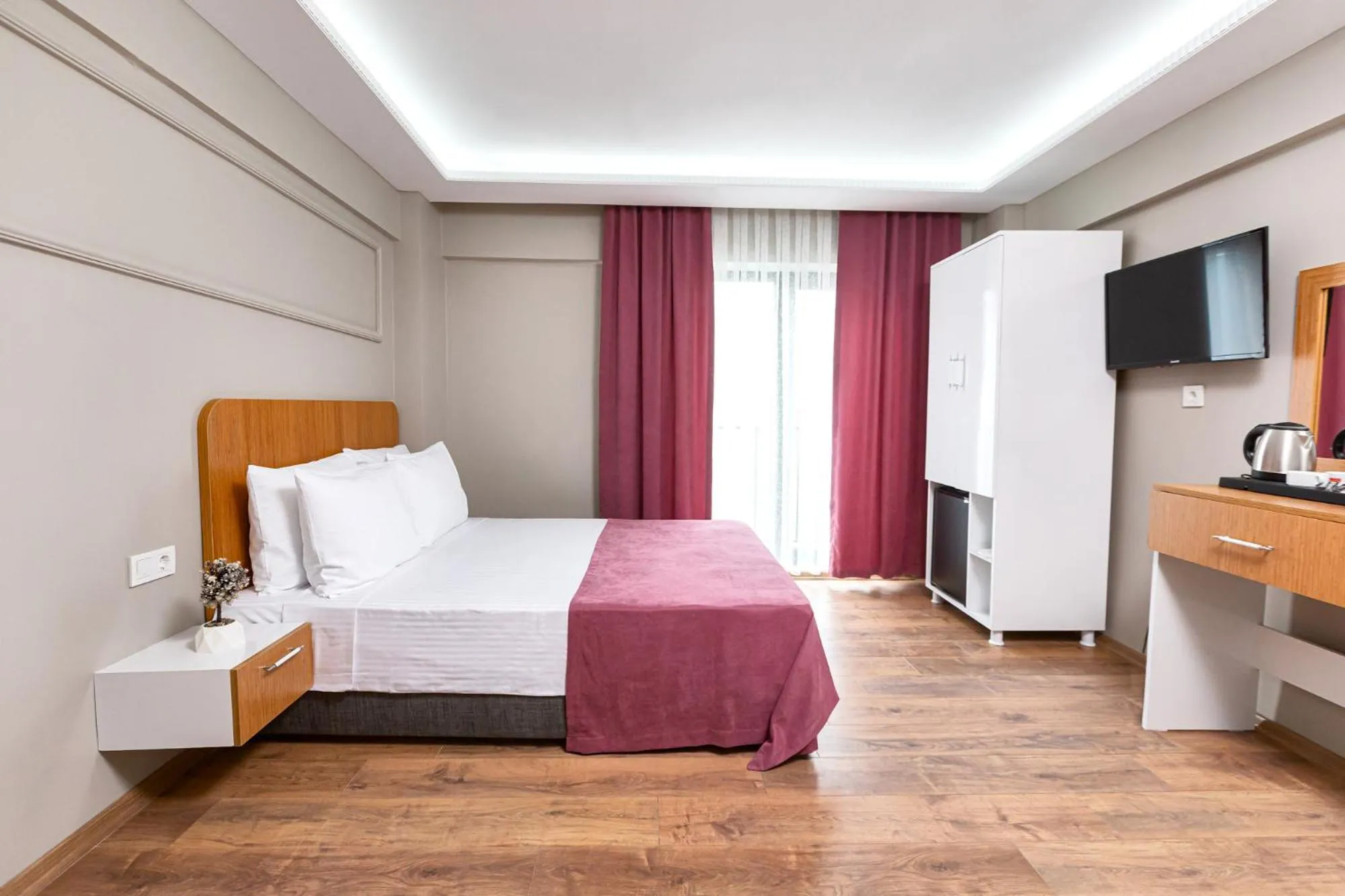 Photo of the whole room, Bed in Ria Suites Boutique Hotel