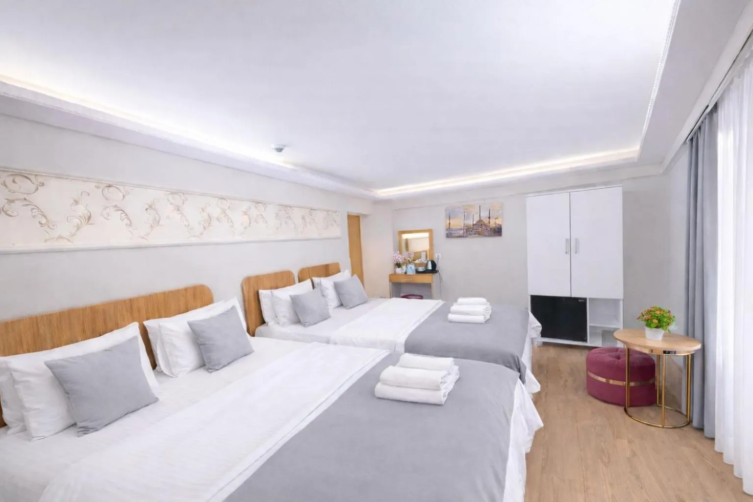 Bed in Ria Suites Boutique Hotel