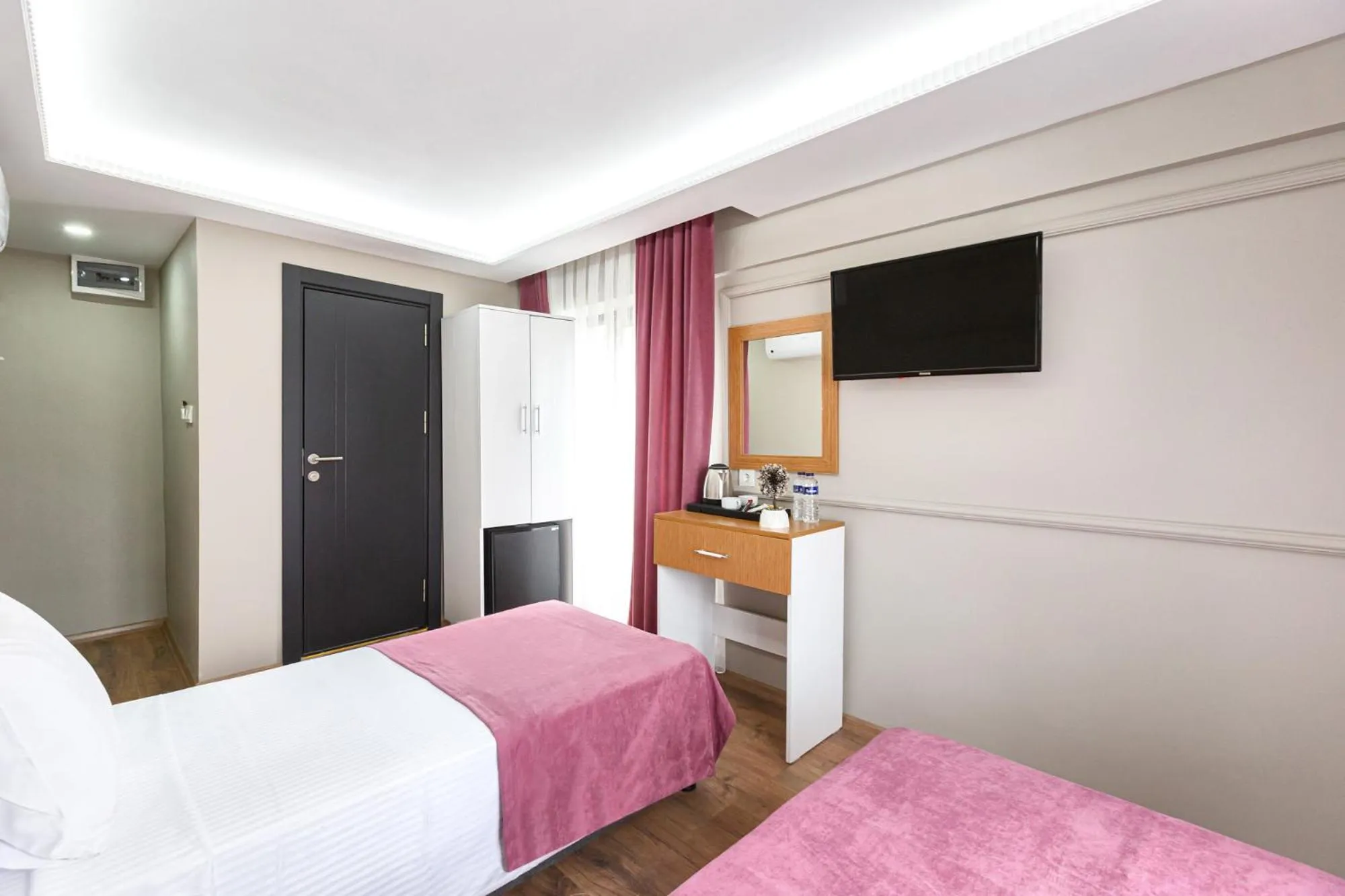 Photo of the whole room, Bed in Ria Suites Boutique Hotel