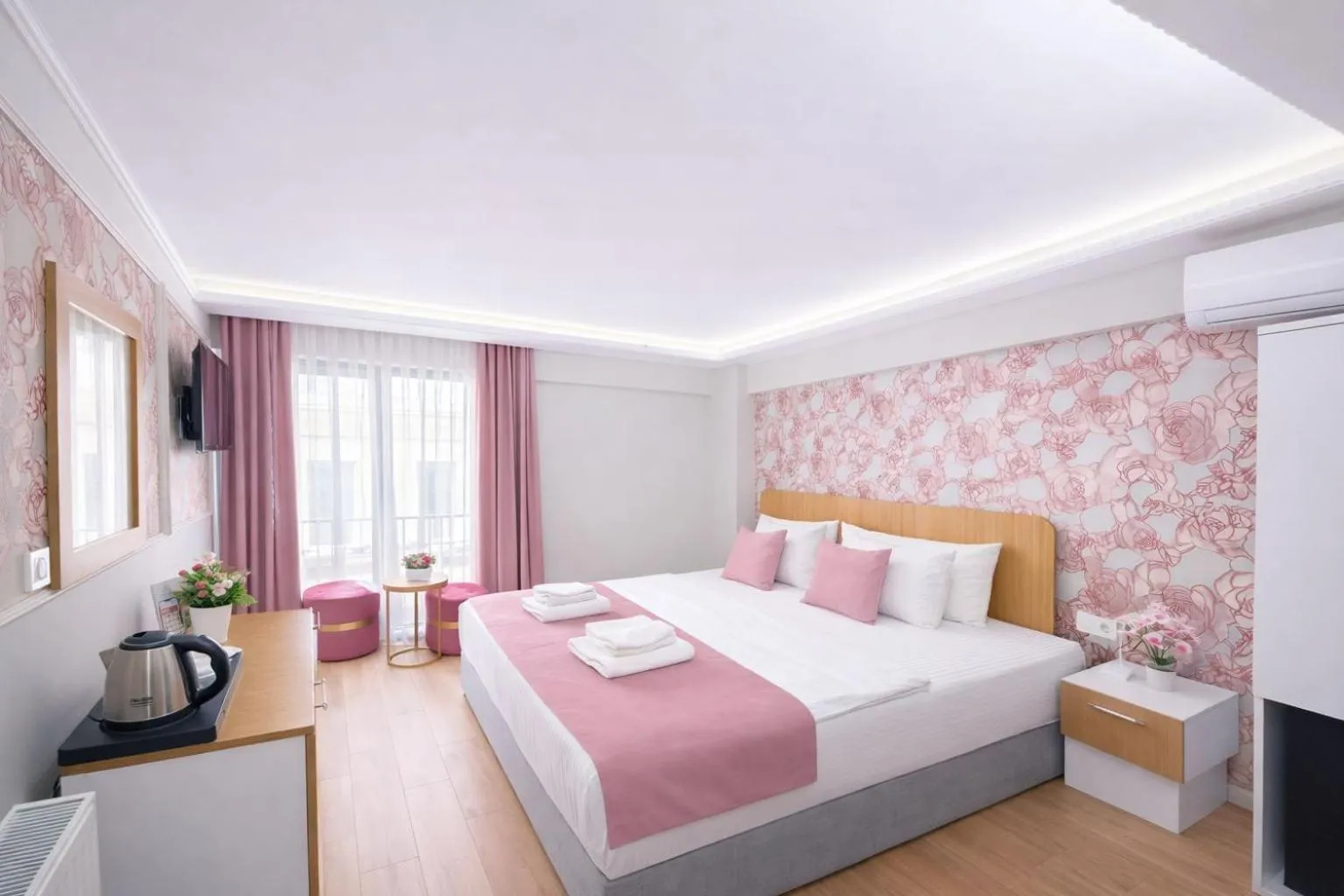 Bed in Ria Suites Boutique Hotel