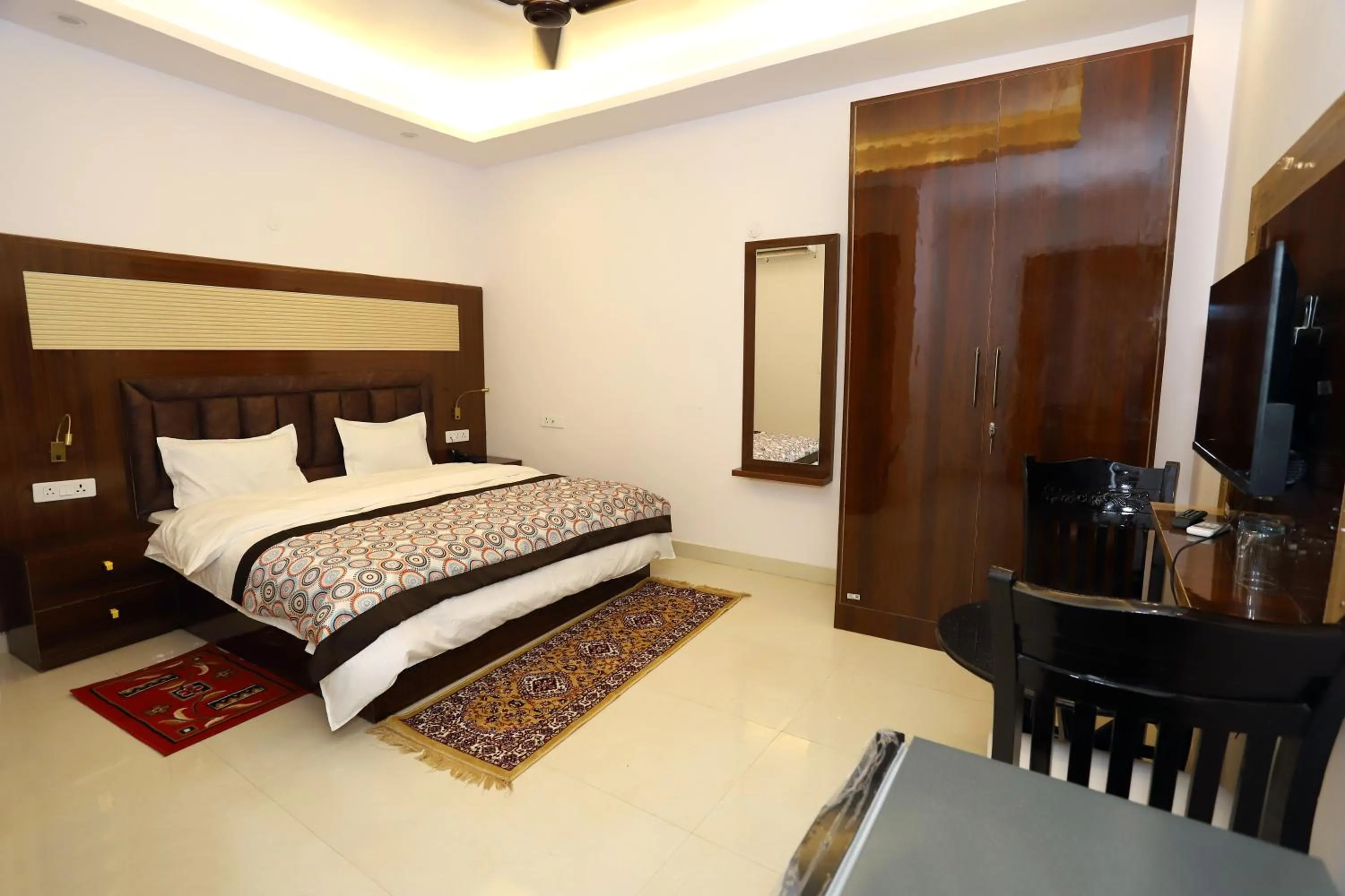 Photo of the whole room, Bed in VRINDAVAN GUEST HOUSE