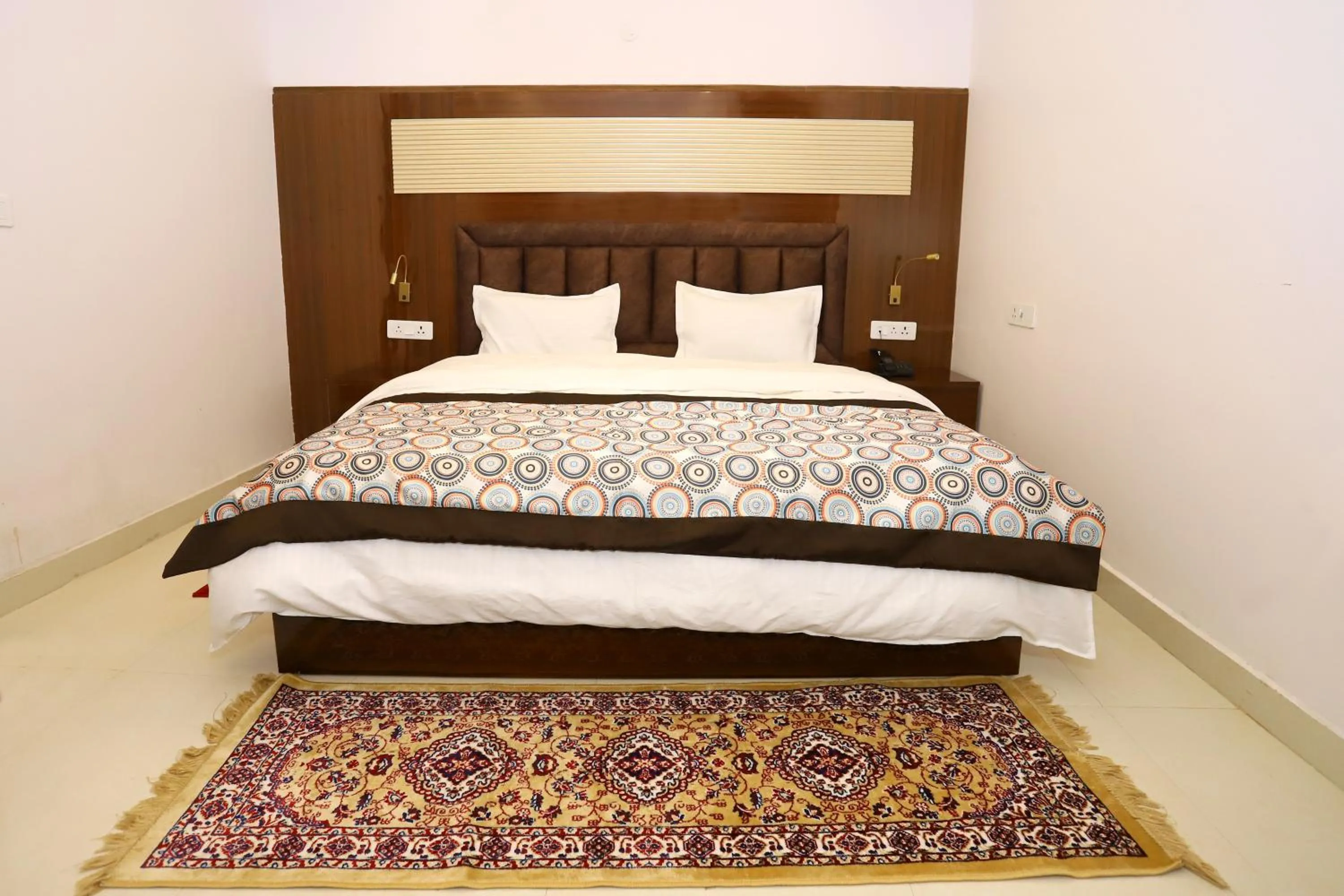 Bed in VRINDAVAN GUEST HOUSE