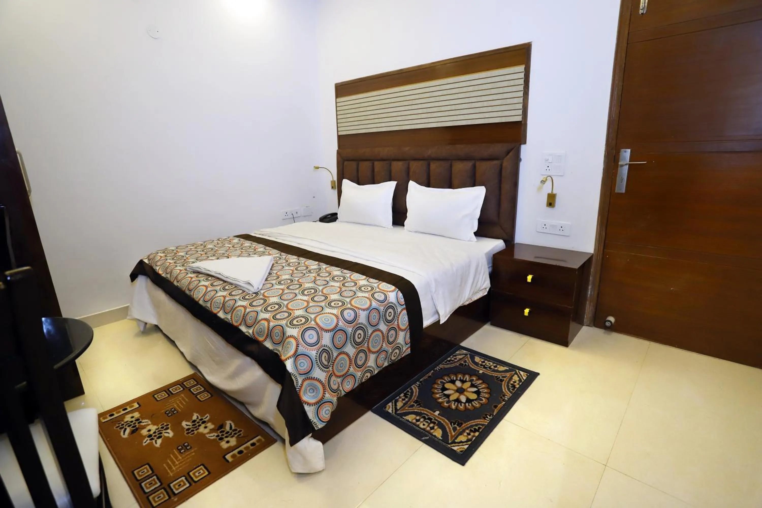 Photo of the whole room, Bed in VRINDAVAN GUEST HOUSE