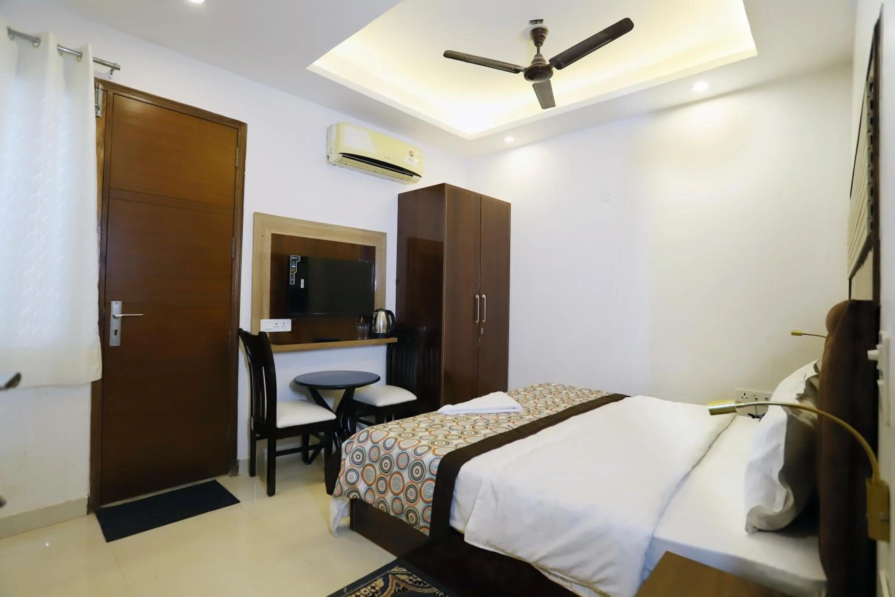 Bed in VRINDAVAN GUEST HOUSE