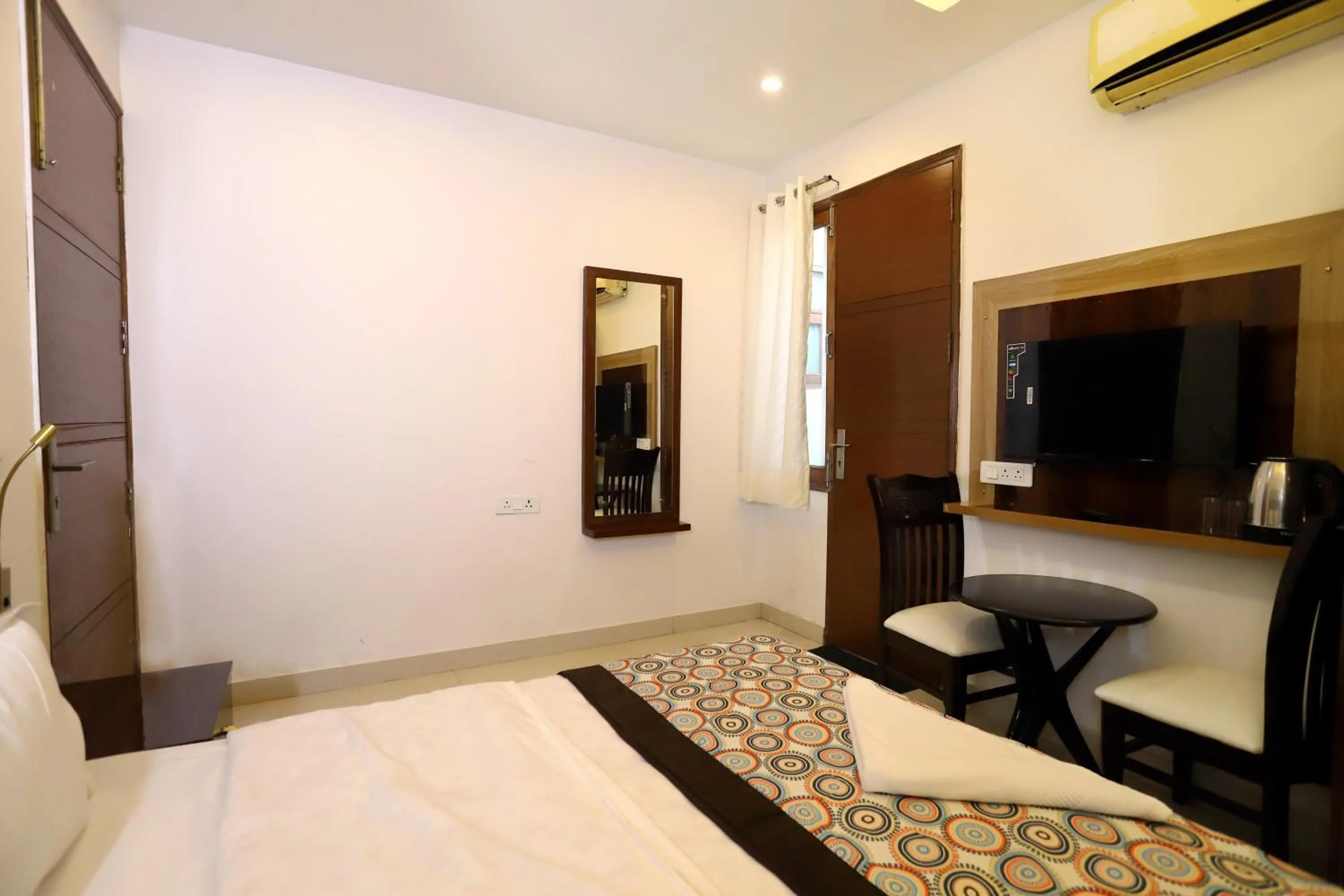 Bed in VRINDAVAN GUEST HOUSE