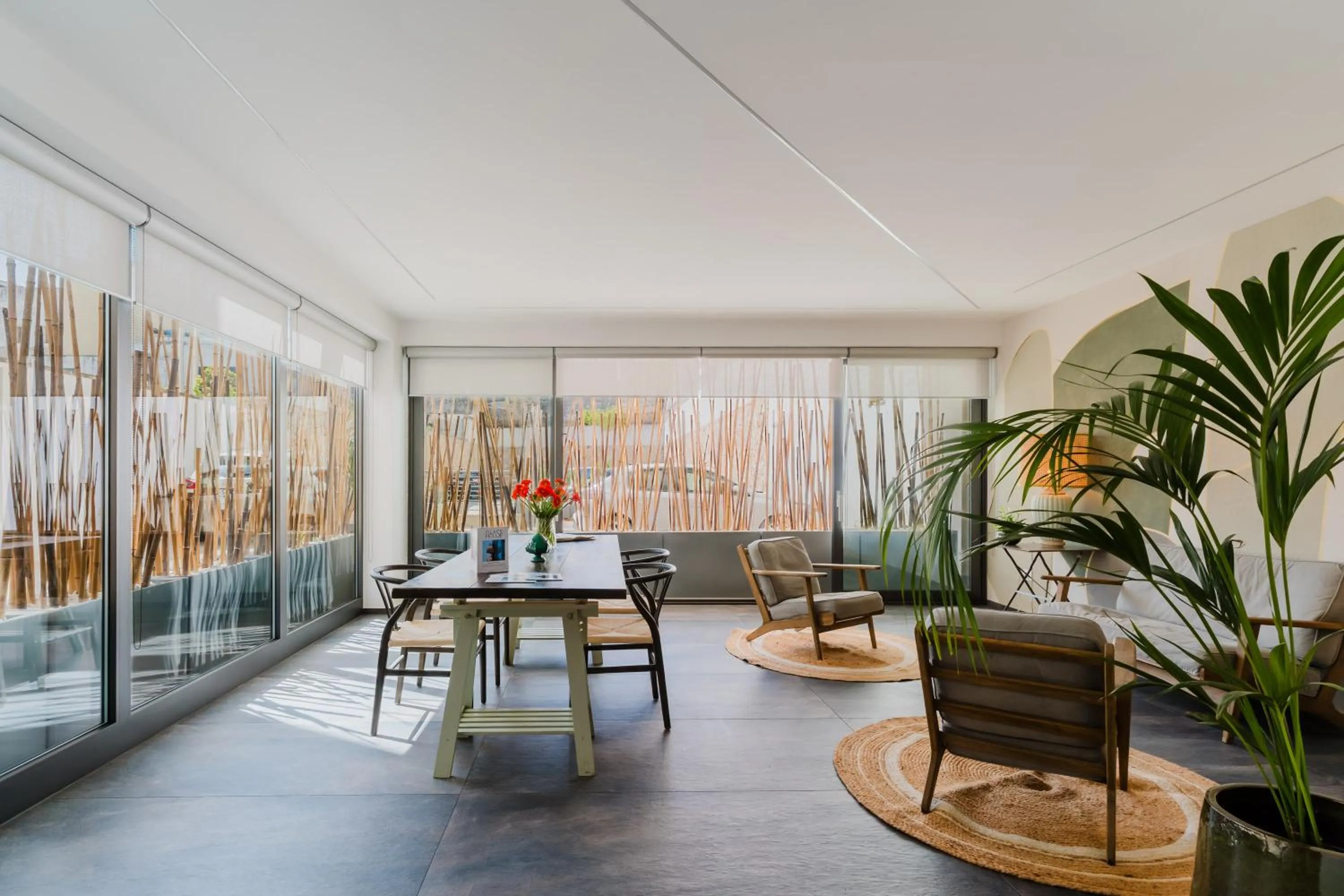 Seating area in Glass House - Smart Rooms & Parking