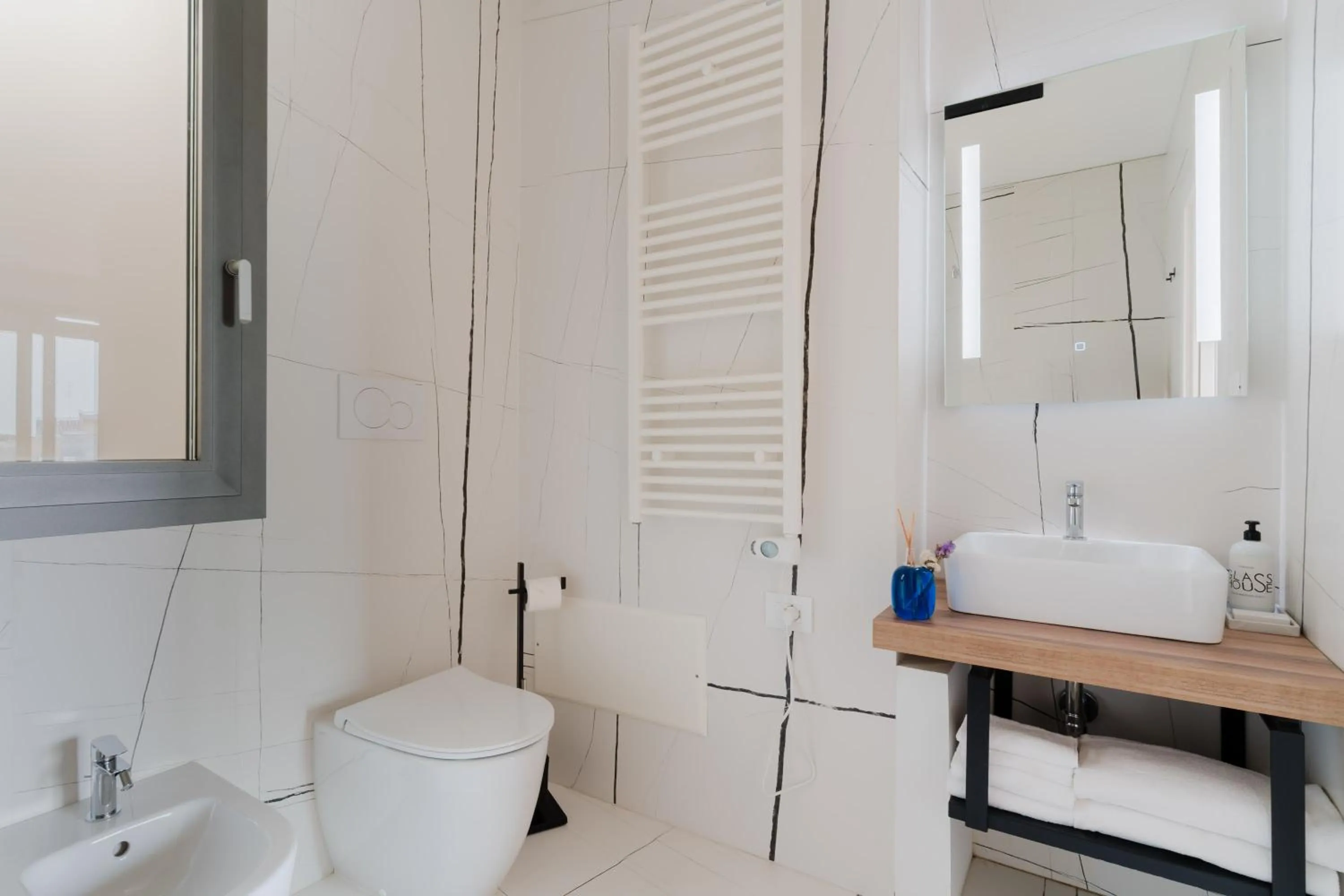 Bathroom in Glass House - Smart Rooms & Parking