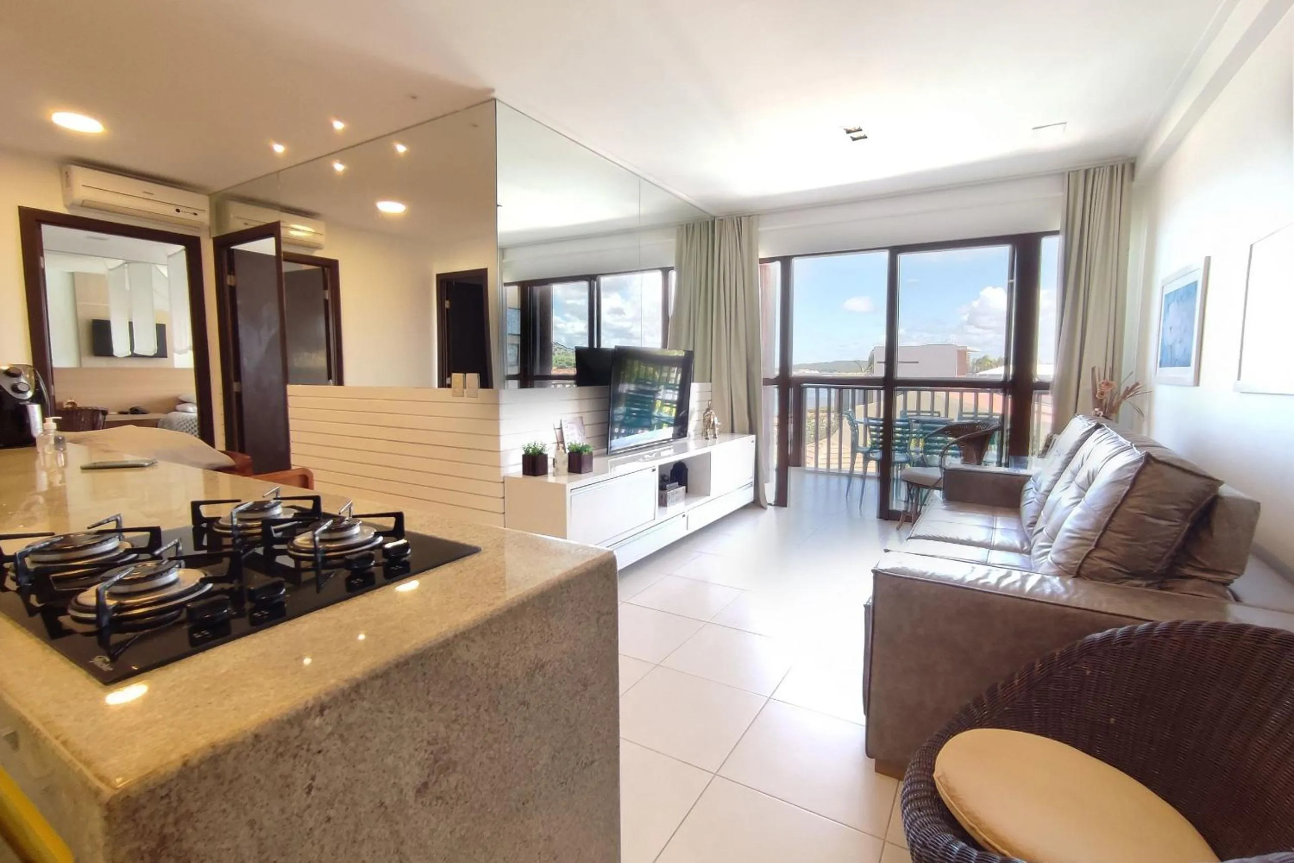 Living room in Barra Bali - Pé na areia com Vista Mar