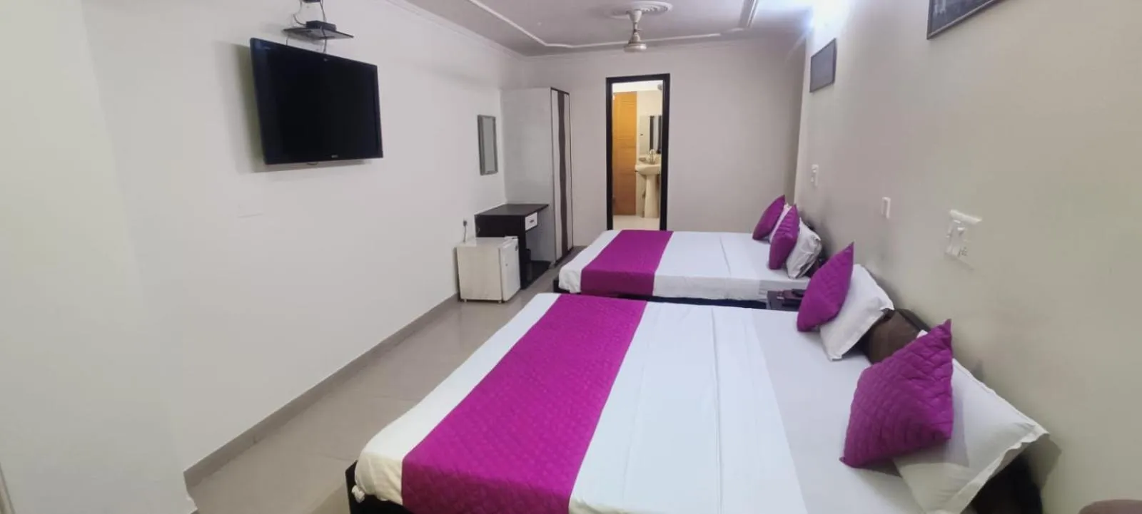 Bed in Hotel Jigyasa By Mayda Hospitality Pvt. Ltd.