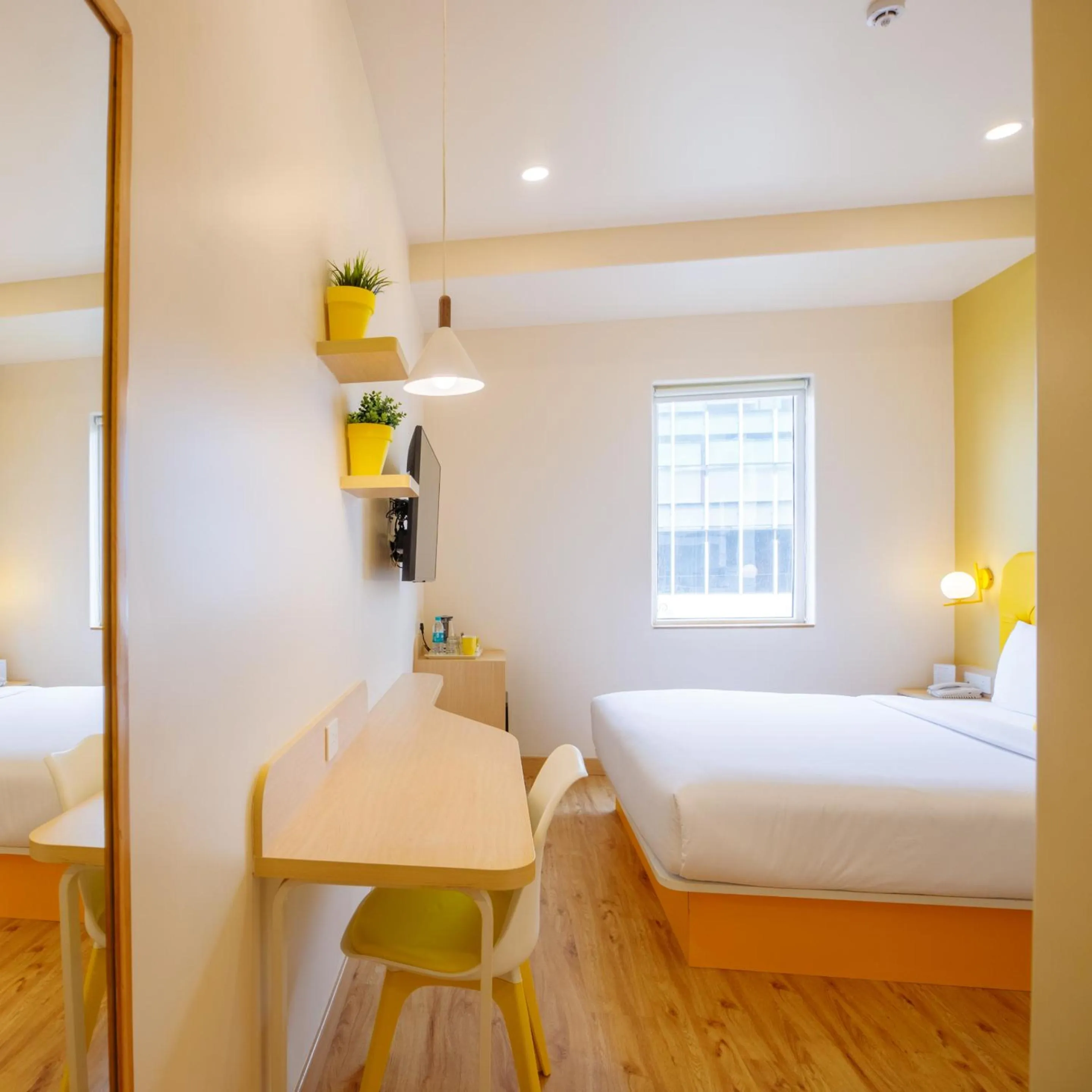 Photo of the whole room, Bed in Bloom Hotel - HSR Layout Sector 6