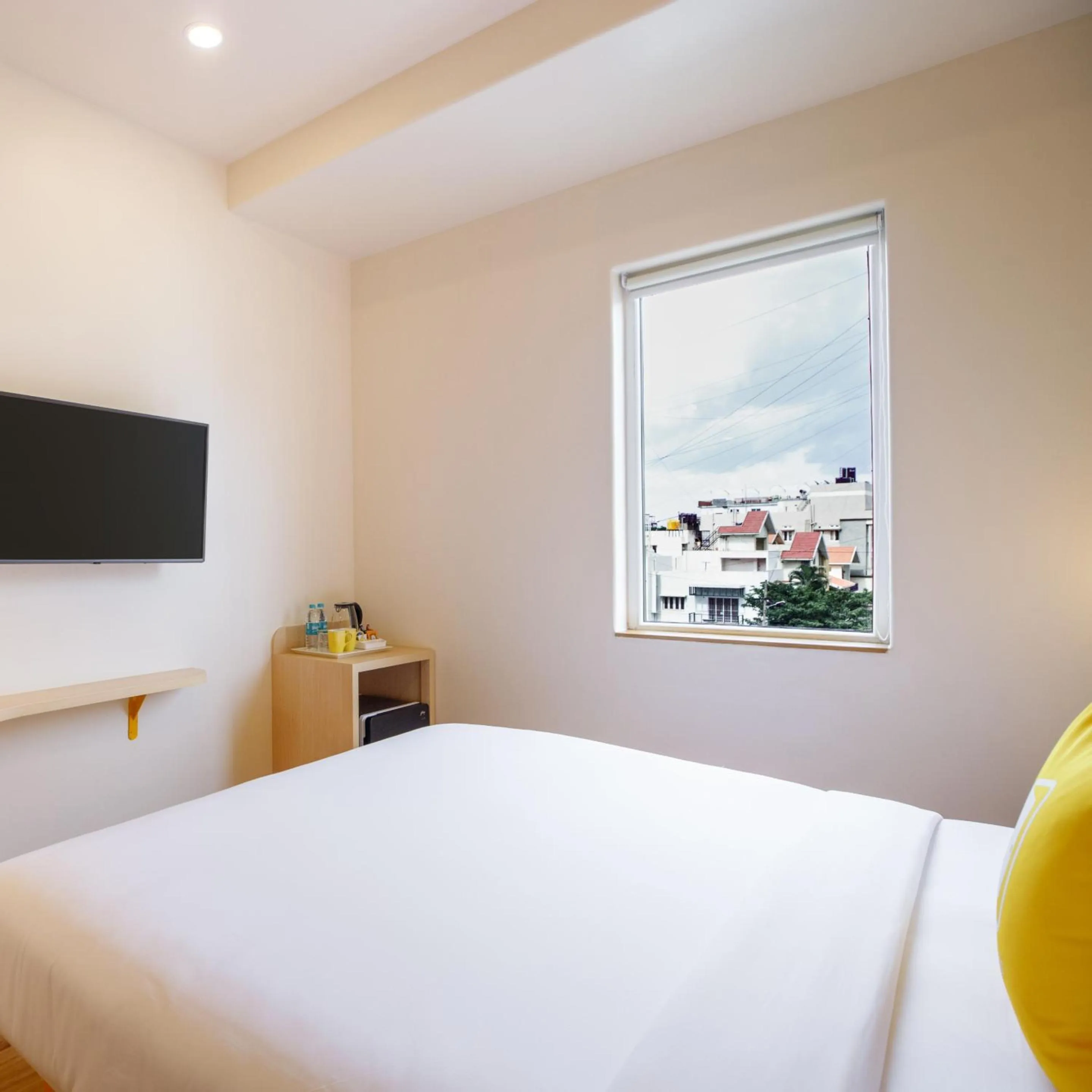 Photo of the whole room, Bed in Bloom Hotel - HSR Layout Sector 6