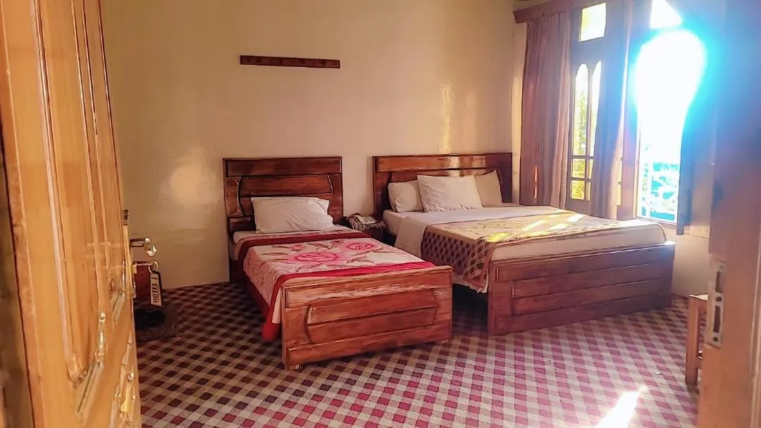 Bed in Hotel Miandam Palace