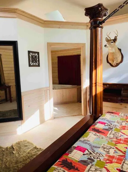 Bed in The Luxury Suite at Bear Mountain