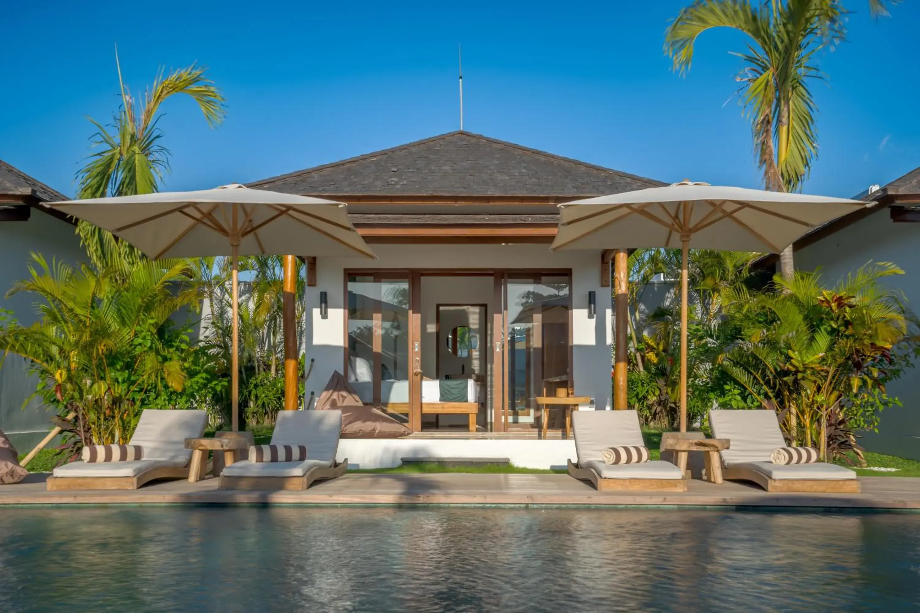 sunbed in EHOA NYANYI BEACH Boutique Hotel - In front of entrance to NUANU sunbed in EHOA NYANYI BEACH Boutique Hotel - In front of entrance to NUANU