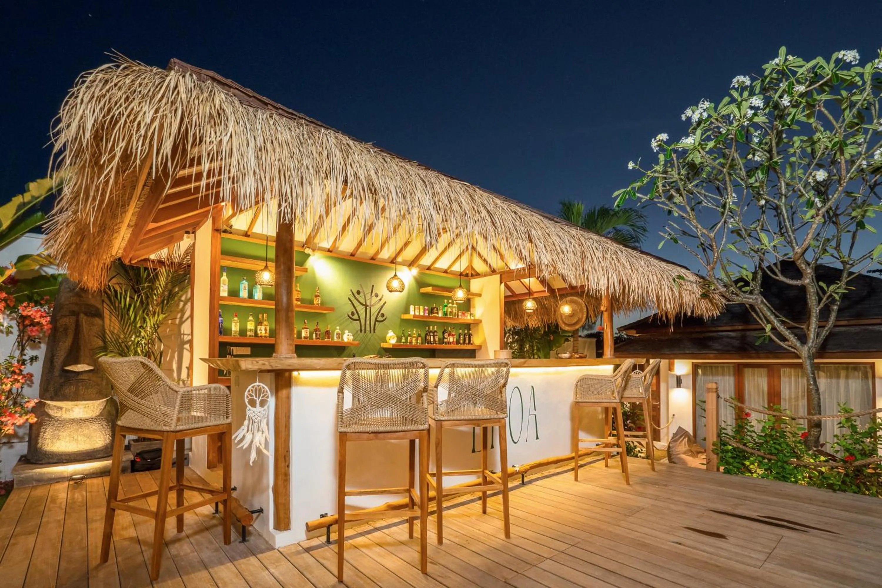 Lounge or bar in EHOA NYANYI BEACH Boutique Hotel - In front of entrance to NUANU