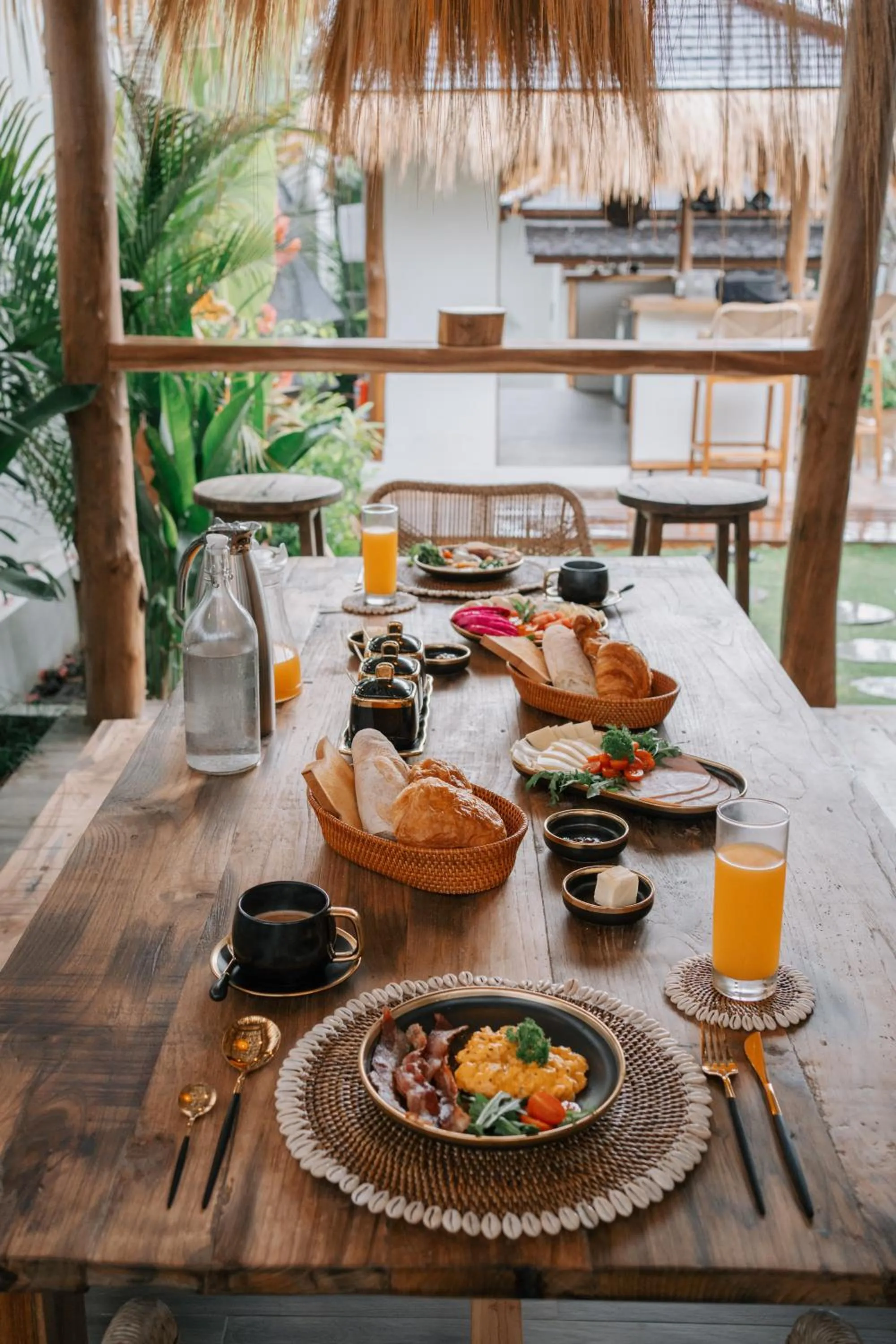 Dining area in EHOA NYANYI BEACH Boutique Hotel - In front of entrance to NUANU