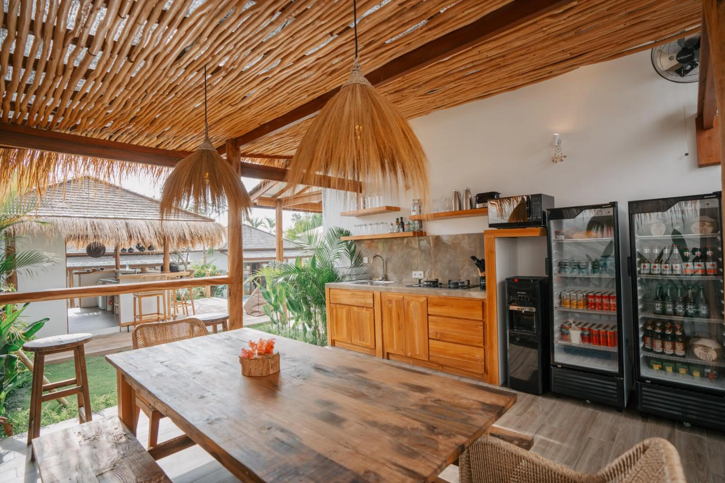 Dining area in EHOA NYANYI BEACH Boutique Hotel - In front of entrance to NUANU