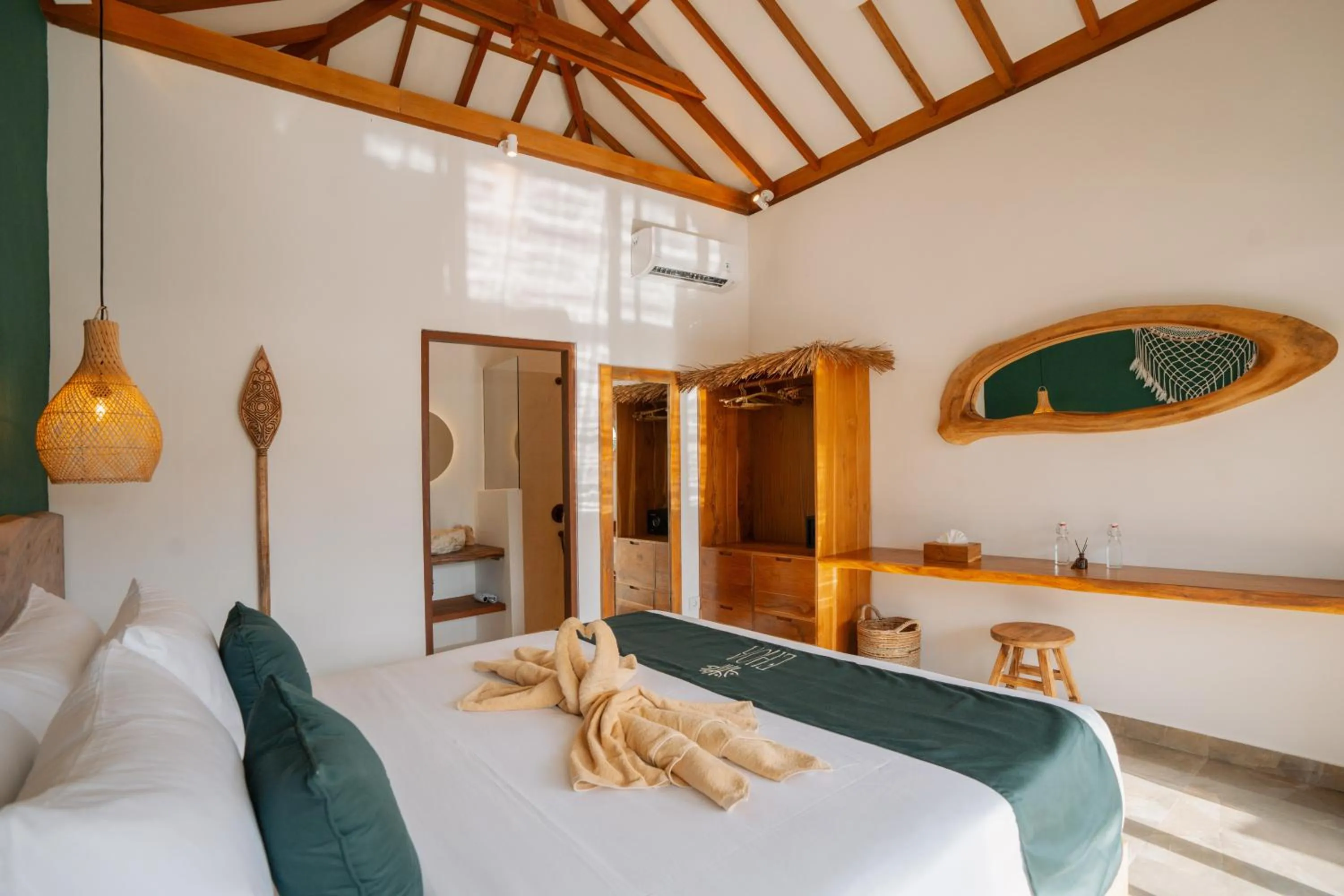 Bedroom, Bed in EHOA NYANYI BEACH Boutique Hotel - In front of entrance to NUANU