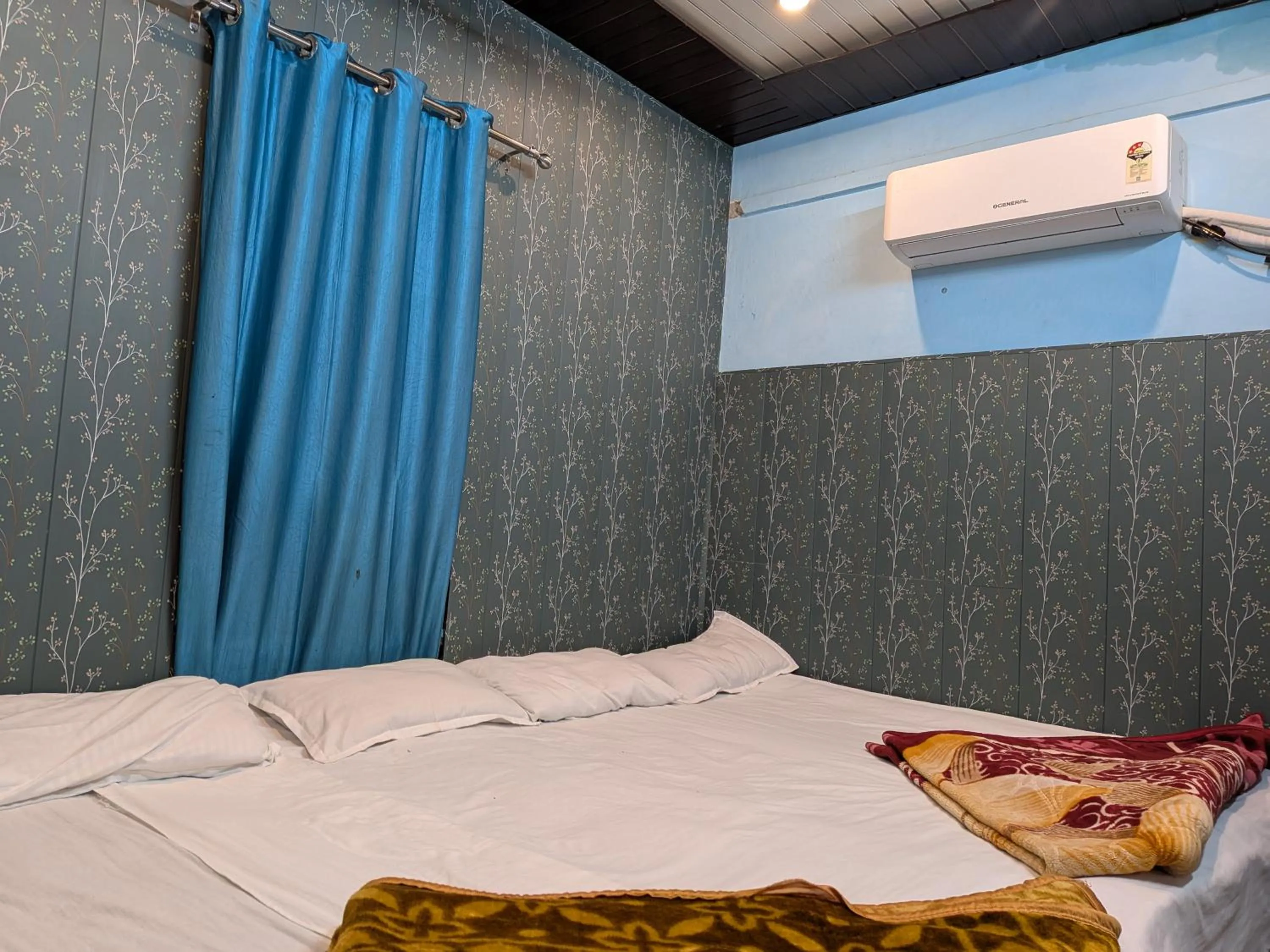 Bed in Maa Tara AC Home Stay