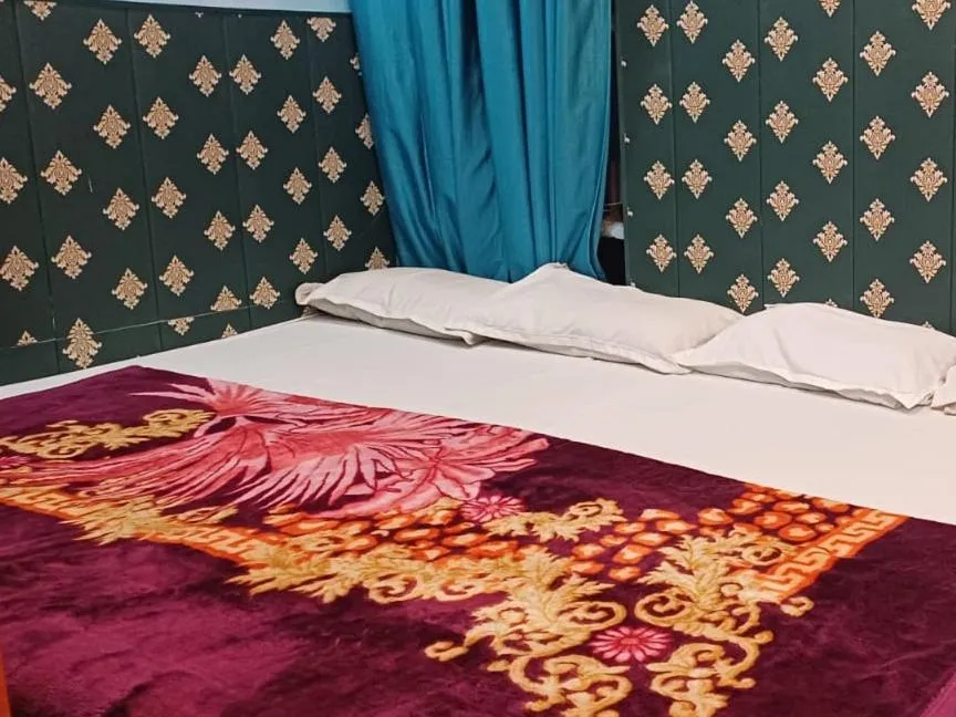 Bed in Maa Tara AC Home Stay