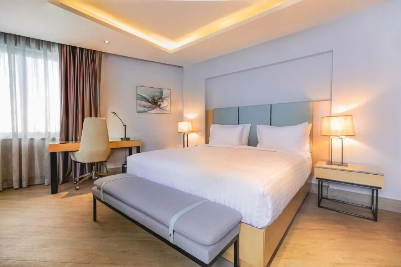 Bed in The Row Residential Hotel