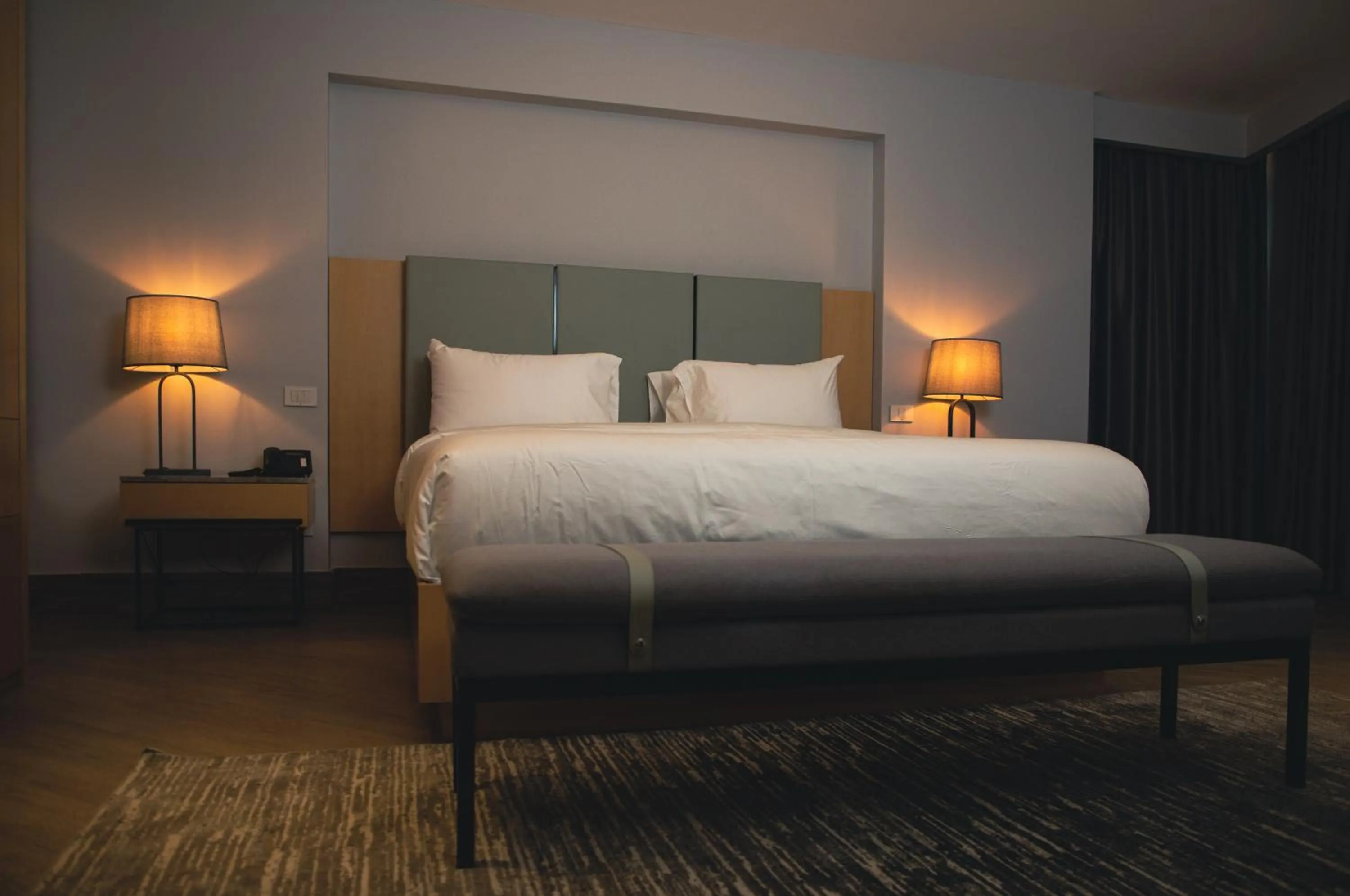Bed in The Row Residential Hotel