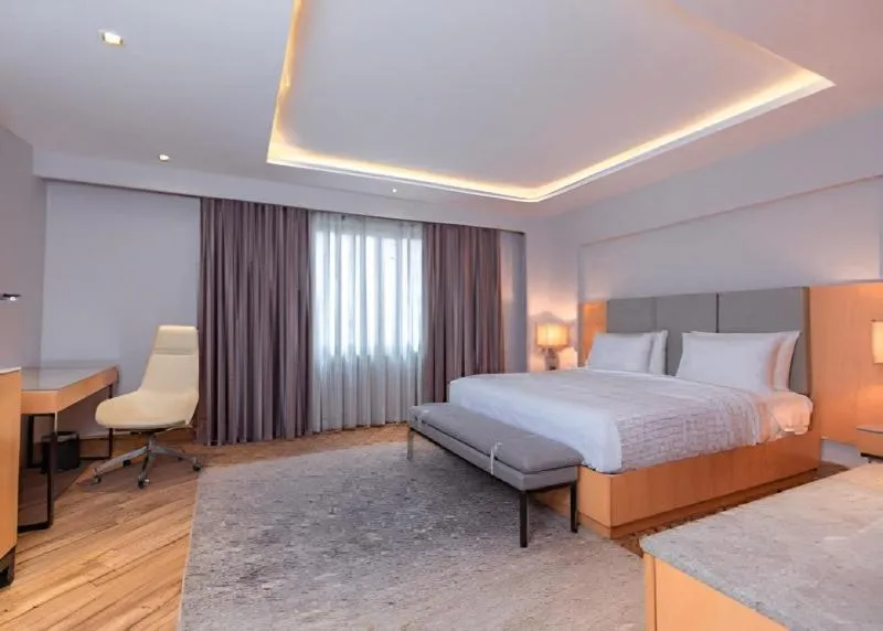 Bed in The Row Residential Hotel