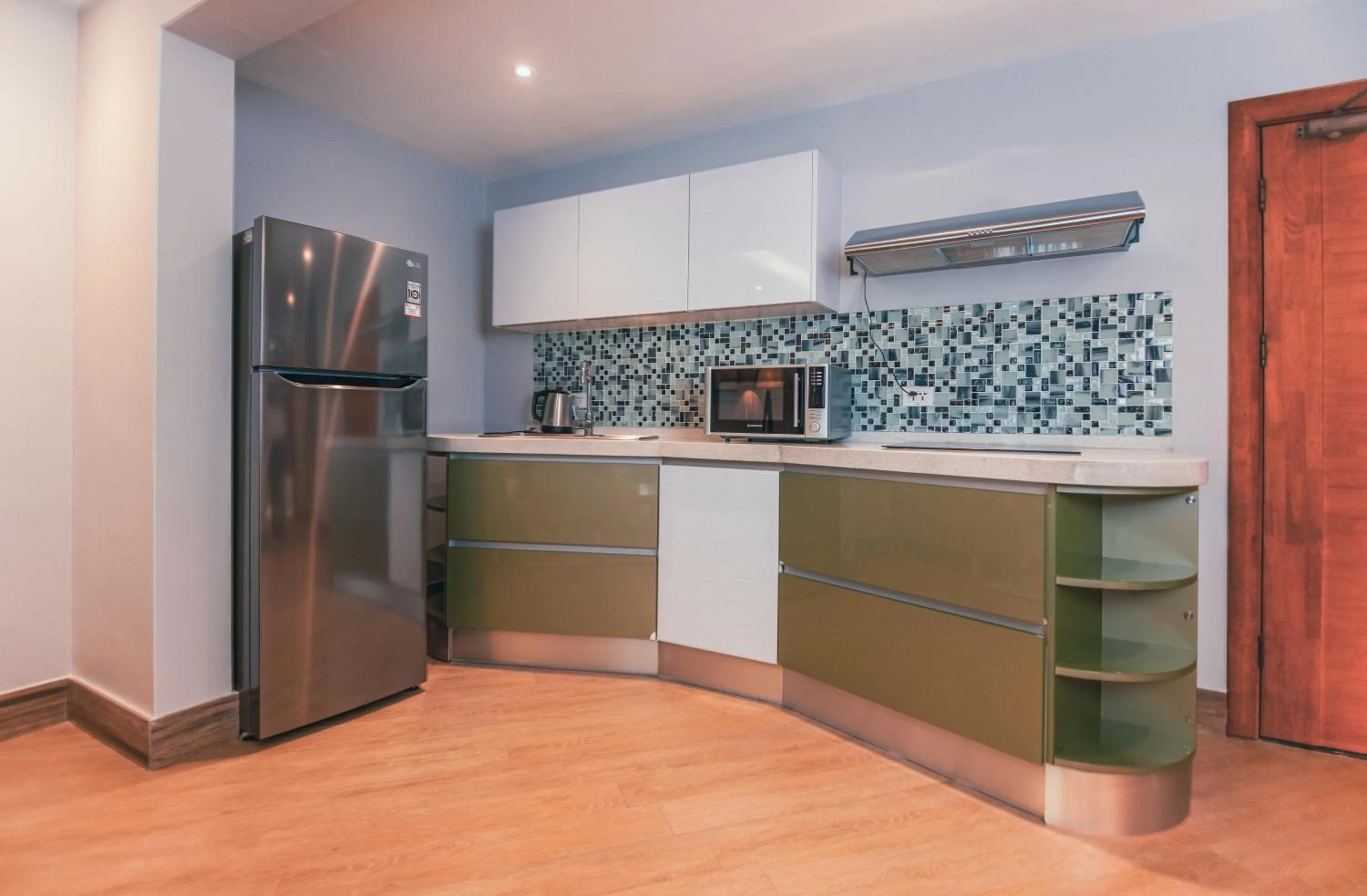 Kitchen or kitchenette in The Row Residential Hotel