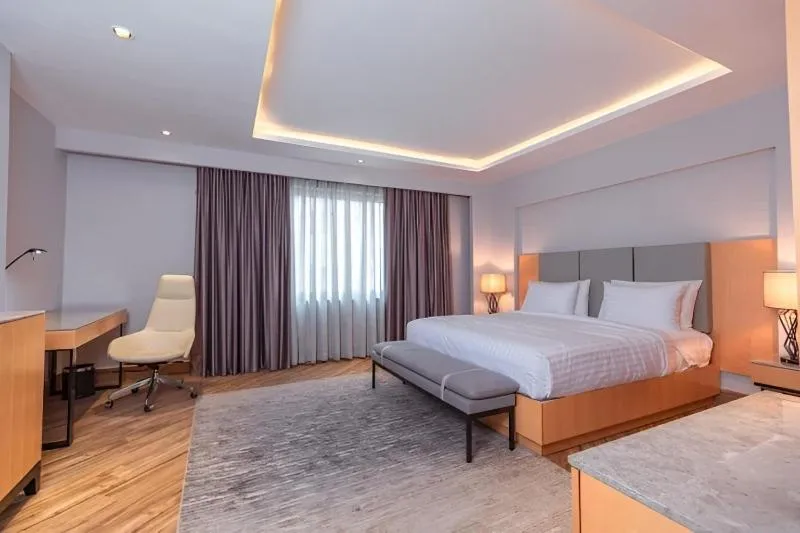 Bed in The Row Residential Hotel
