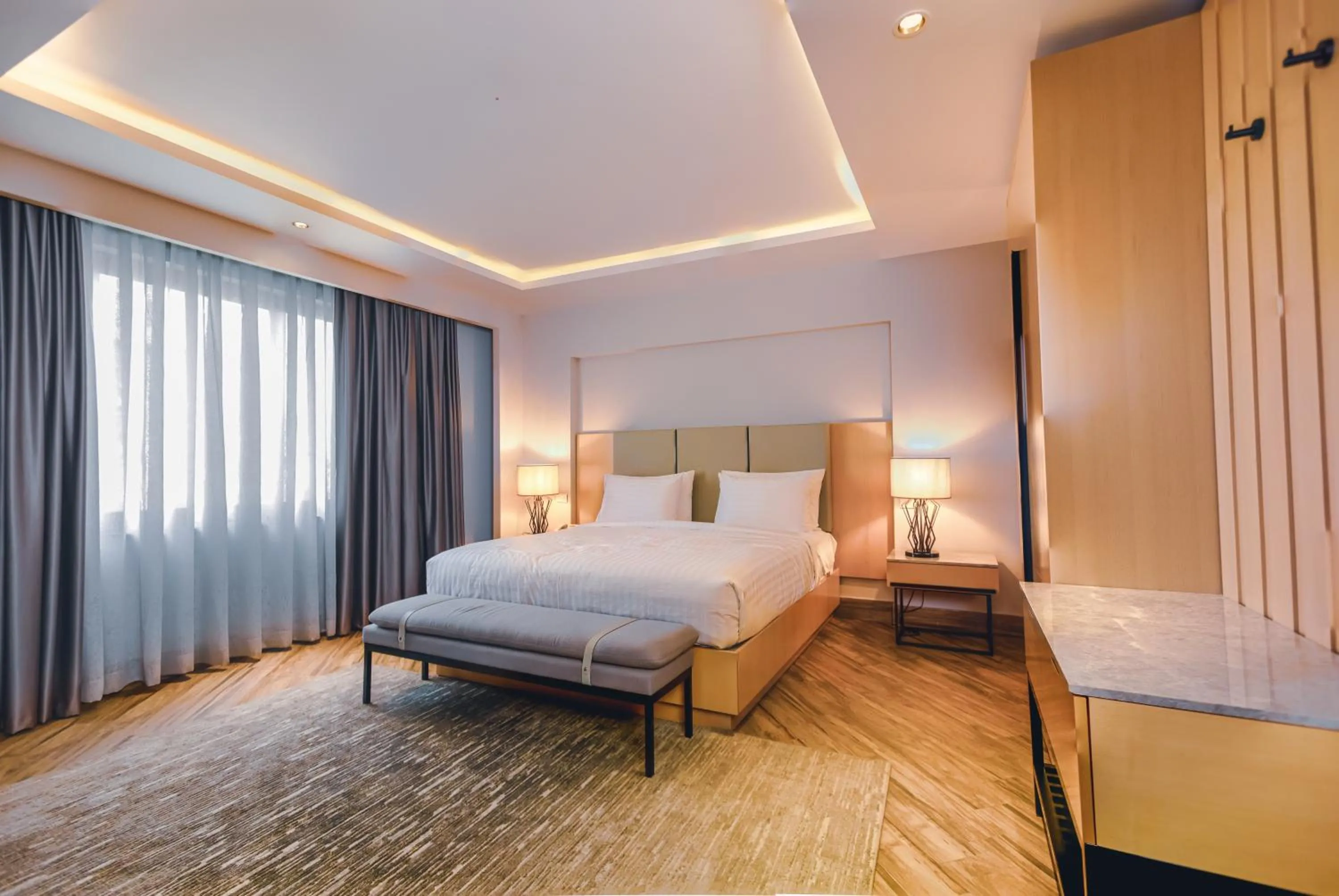 Bed in The Row Residential Hotel