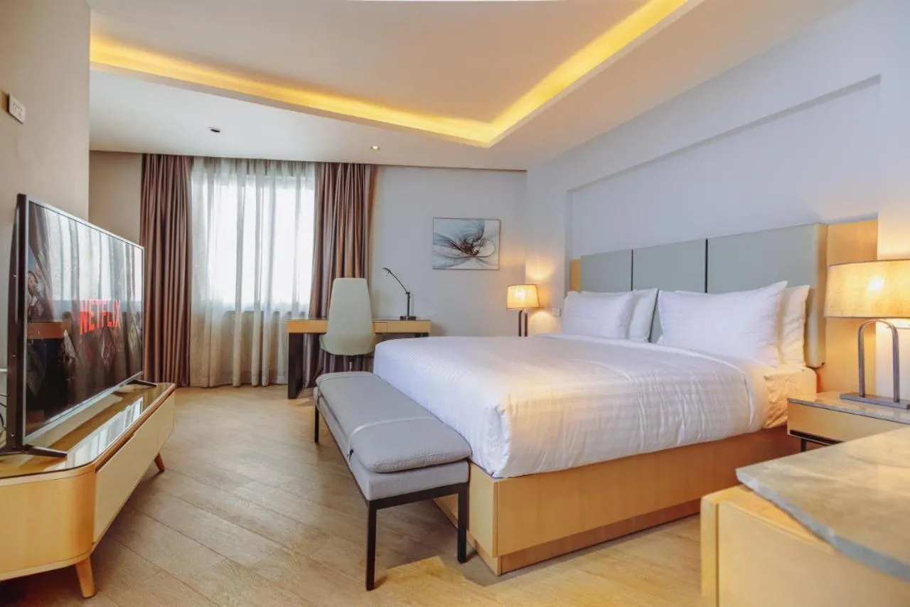Bed in The Row Residential Hotel