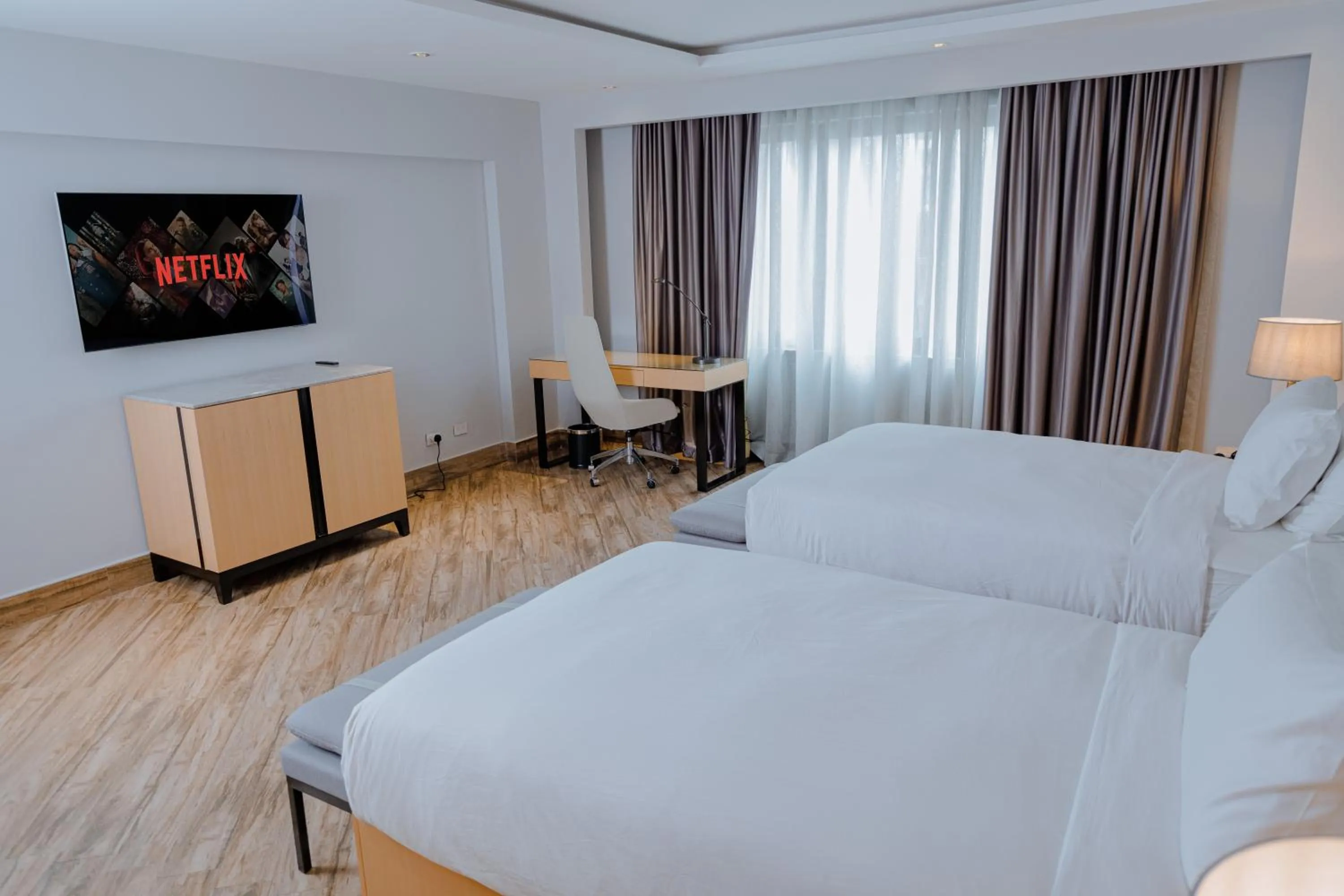 Bed in The Row Residential Hotel