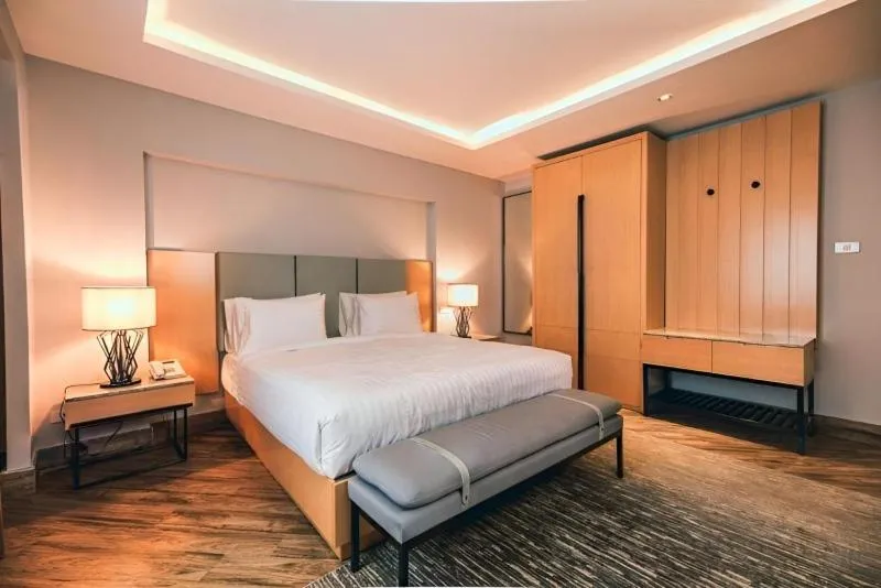 Bed in The Row Residential Hotel