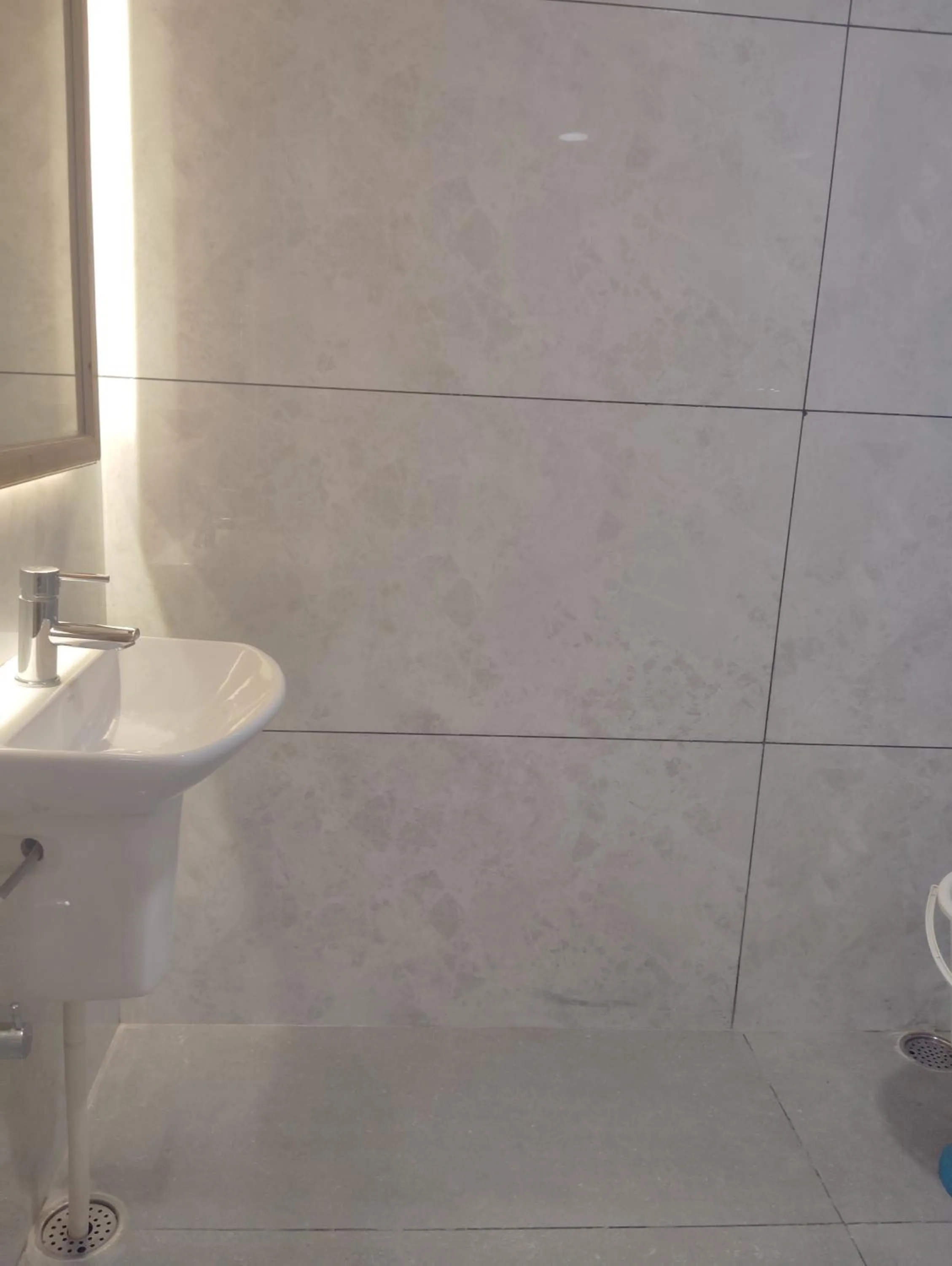 Bathroom in Hotel CM Palace - Pure Vegetarian